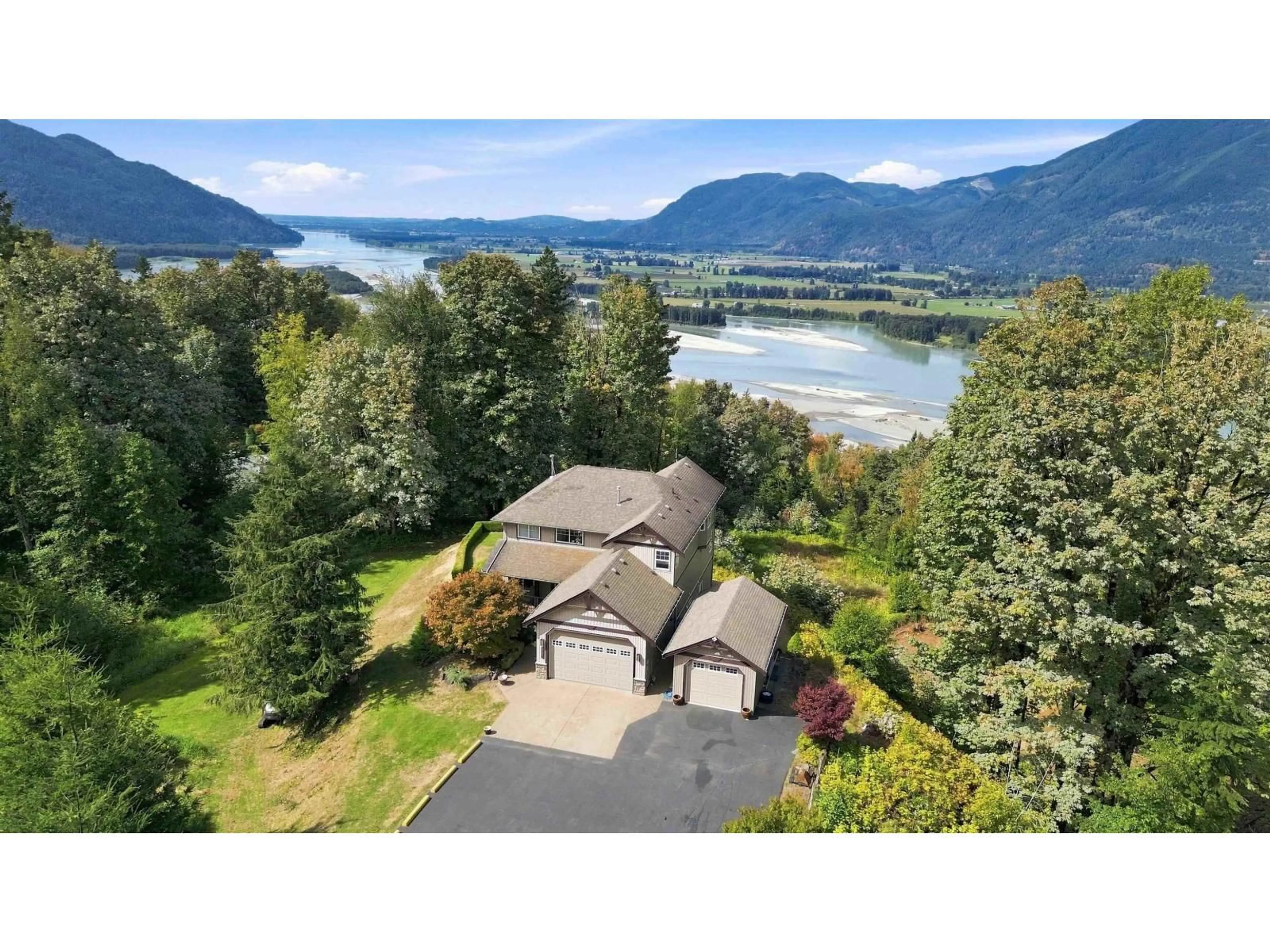 A pic from outside/outdoor area/front of a property/back of a property/a pic from drone, water/lake/river/ocean view for 43251 SALMONBERRY DRIVE, Chilliwack British Columbia V2R4A4