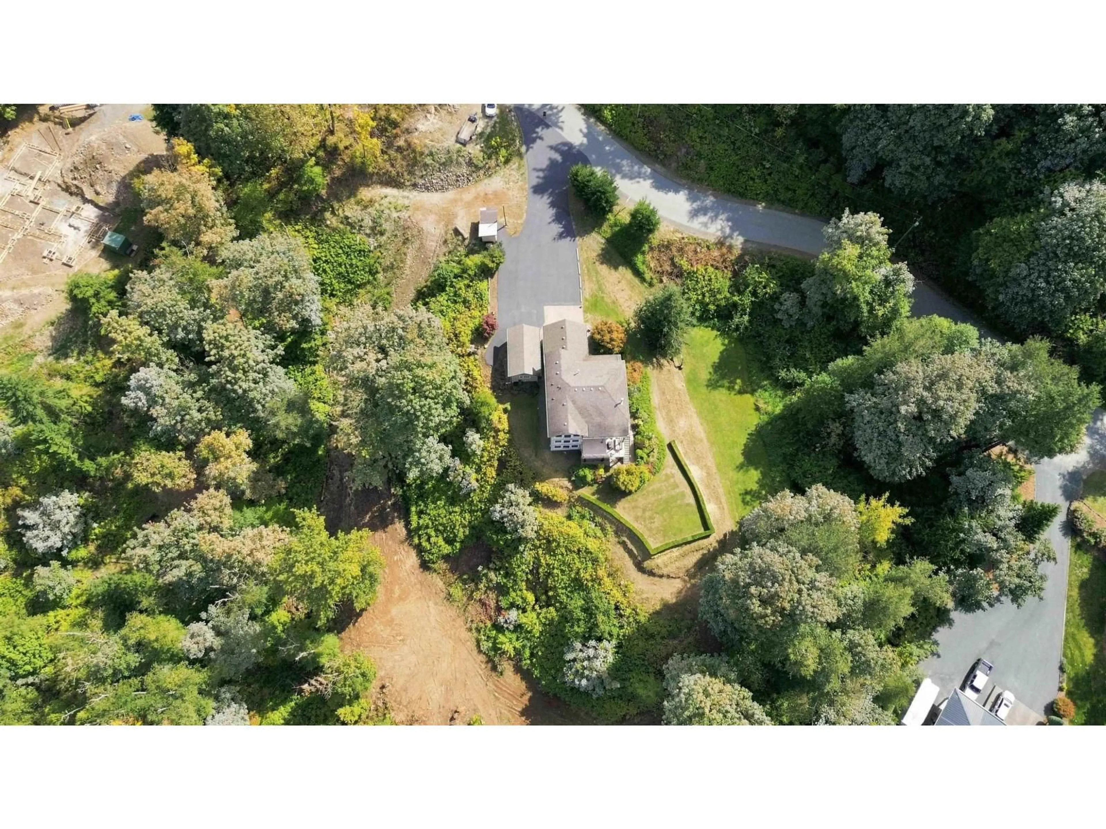 A pic from outside/outdoor area/front of a property/back of a property/a pic from drone, forest/trees view for 43251 SALMONBERRY DRIVE, Chilliwack British Columbia V2R4A4