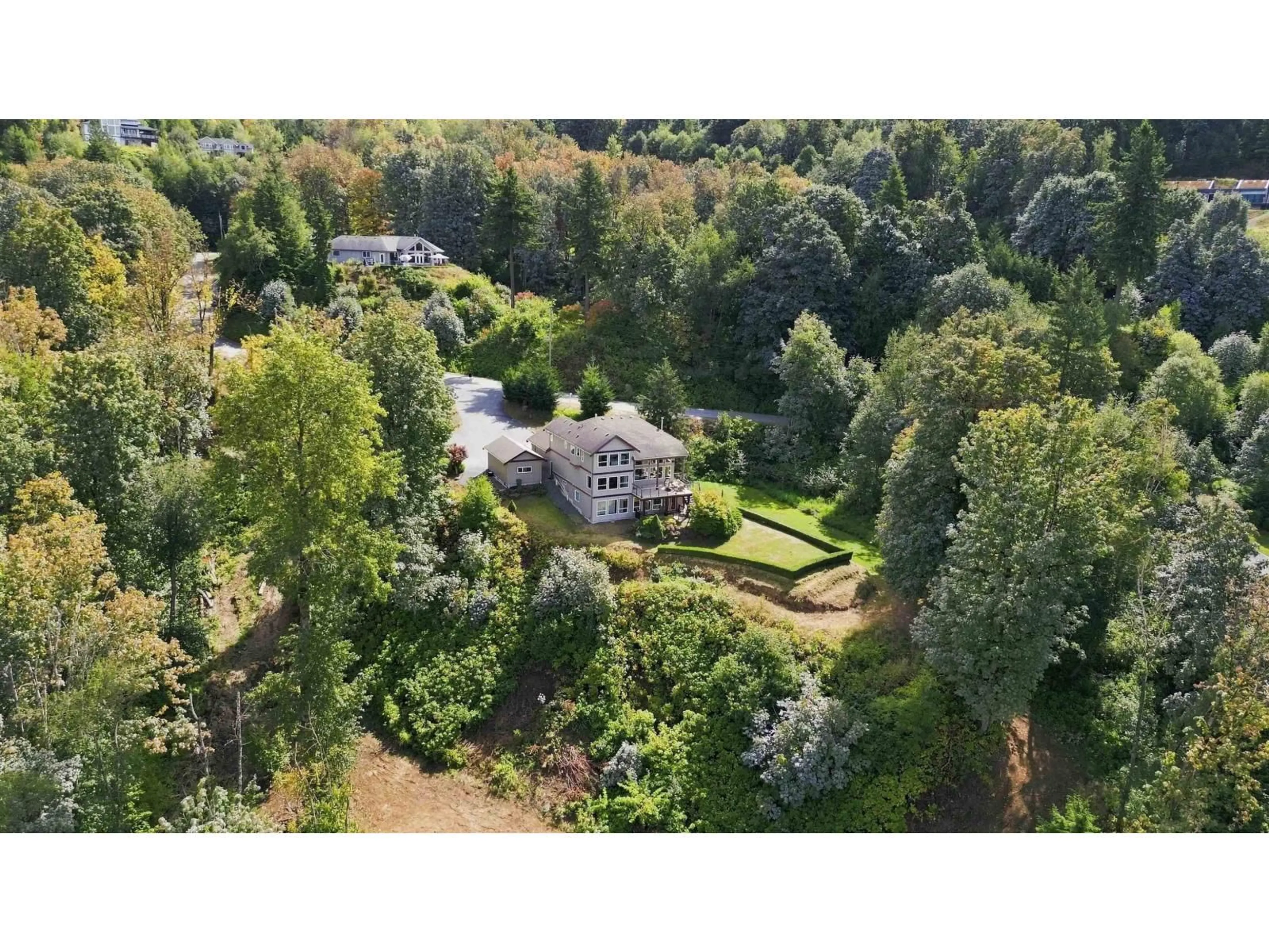 A pic from outside/outdoor area/front of a property/back of a property/a pic from drone, forest/trees view for 43251 SALMONBERRY DRIVE, Chilliwack British Columbia V2R4A4