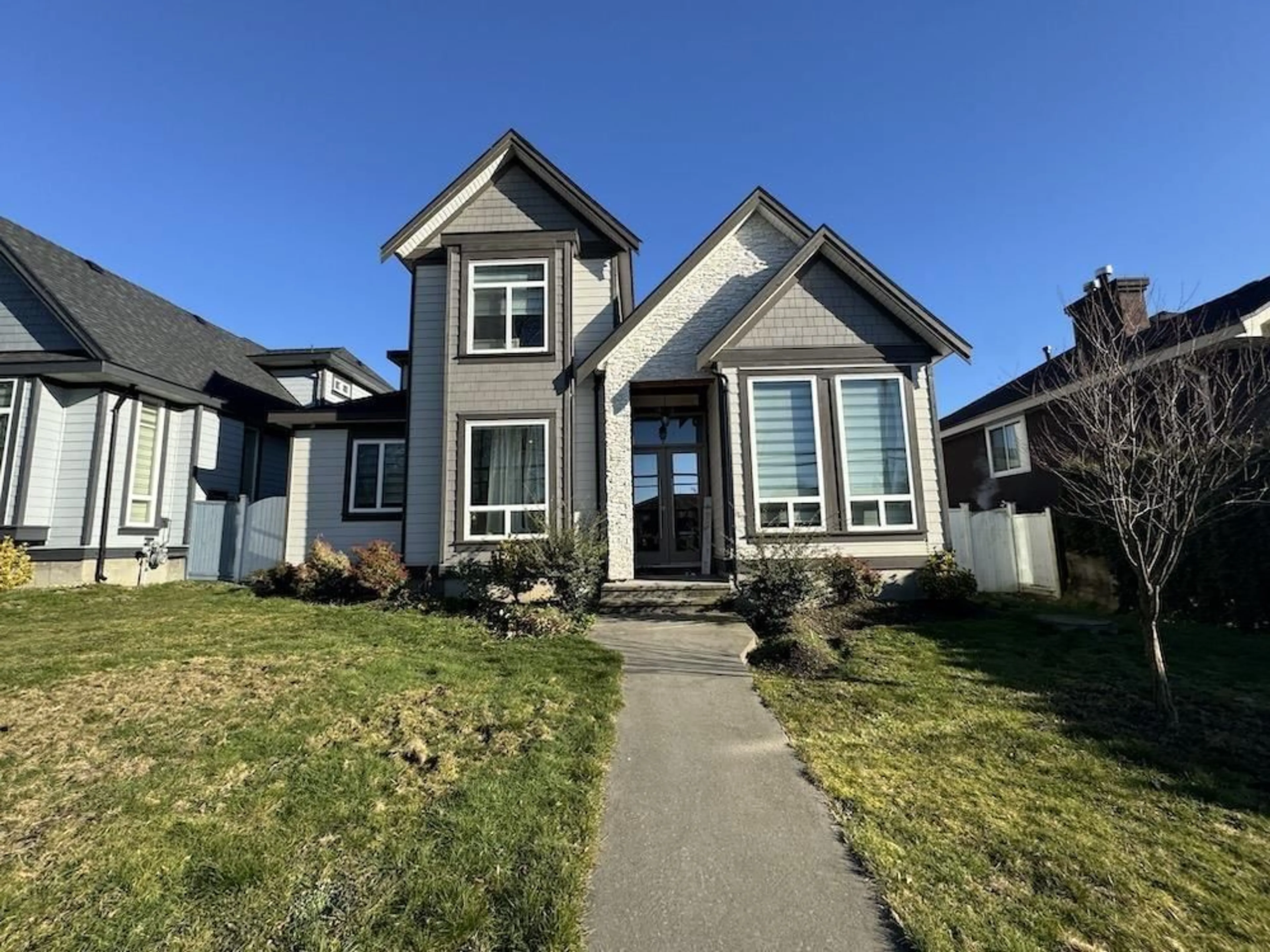 Home with vinyl exterior material, street for 10850 156 STREET, Surrey British Columbia V3R6J6