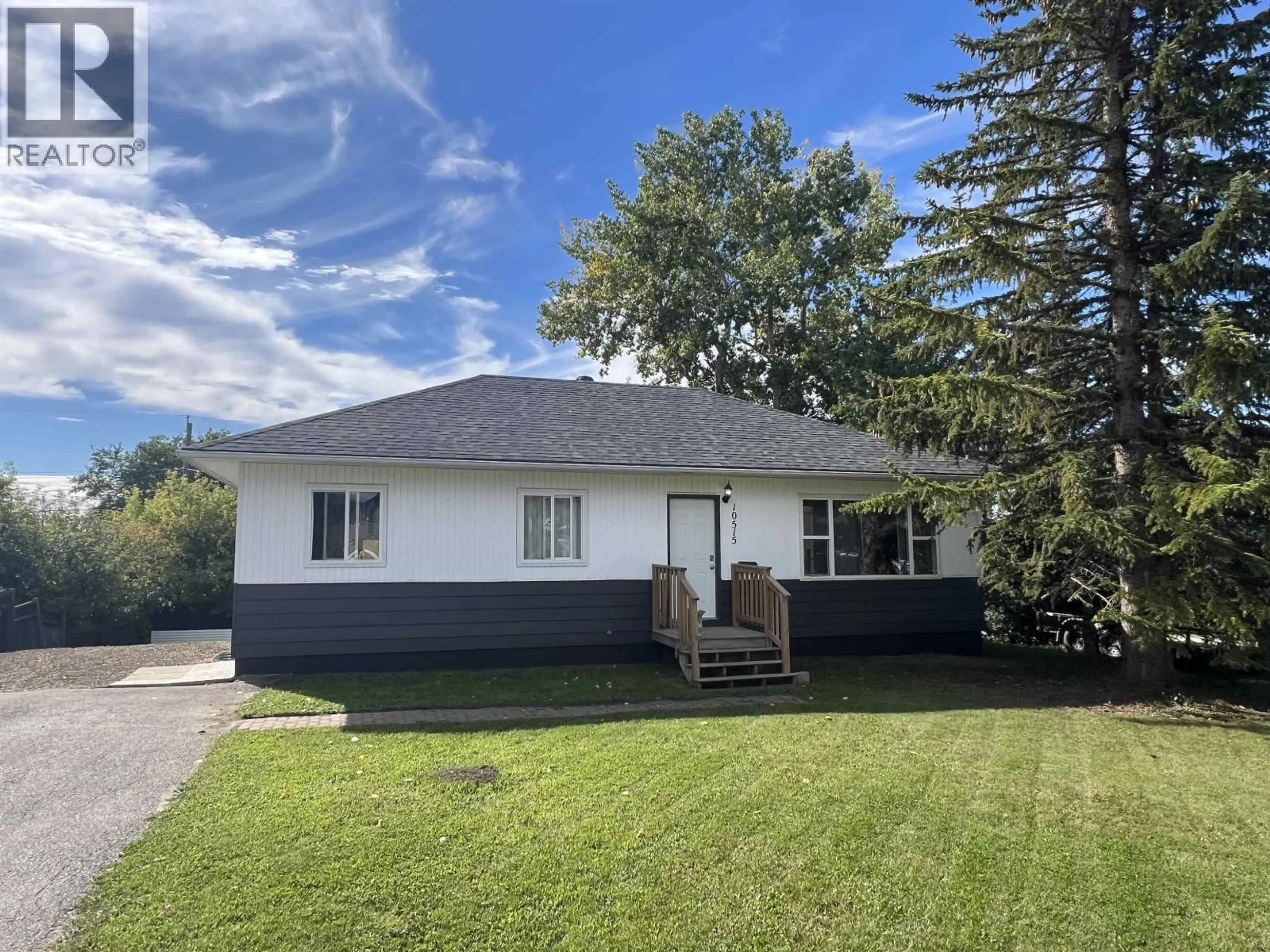A pic from outside/outdoor area/front of a property/back of a property/a pic from drone, unknown for 10515 104 AVENUE, Fort St. John British Columbia V1J8E1