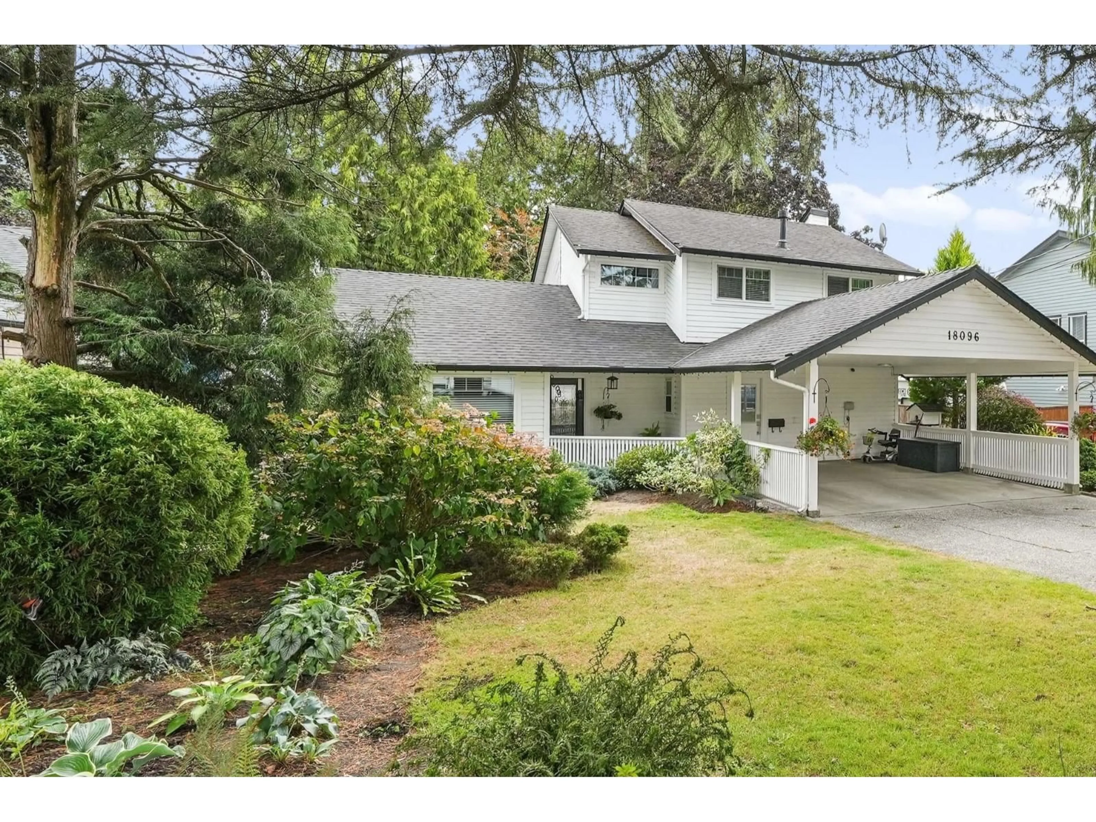 A pic from outside/outdoor area/front of a property/back of a property/a pic from drone, street for 18096 61A AVENUE, Surrey British Columbia V3S5V8
