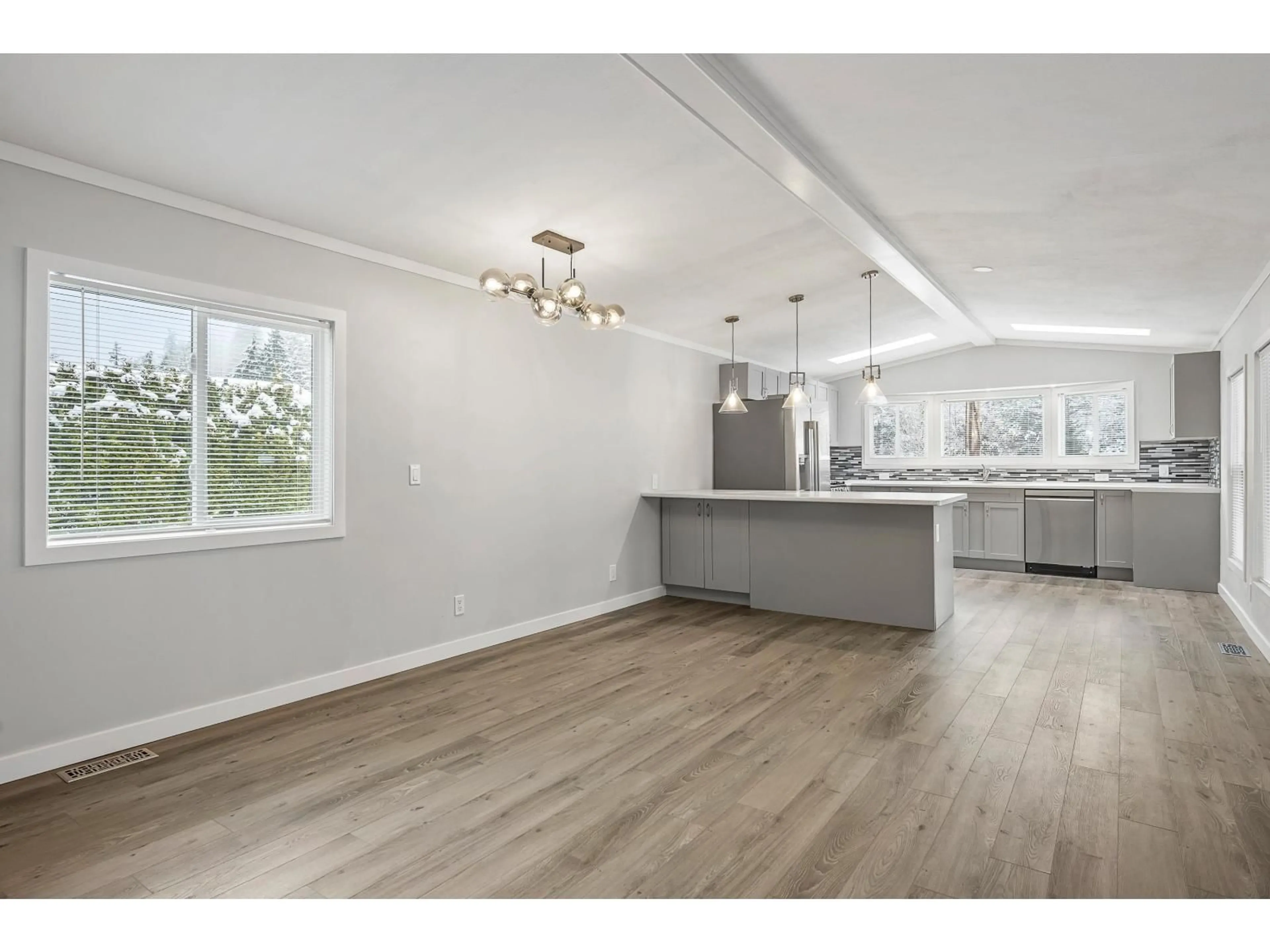 Open concept kitchen, wood/laminate floor for 30 - 65367 KAWKAWA LAKE ROAD, Hope British Columbia V0X1L1
