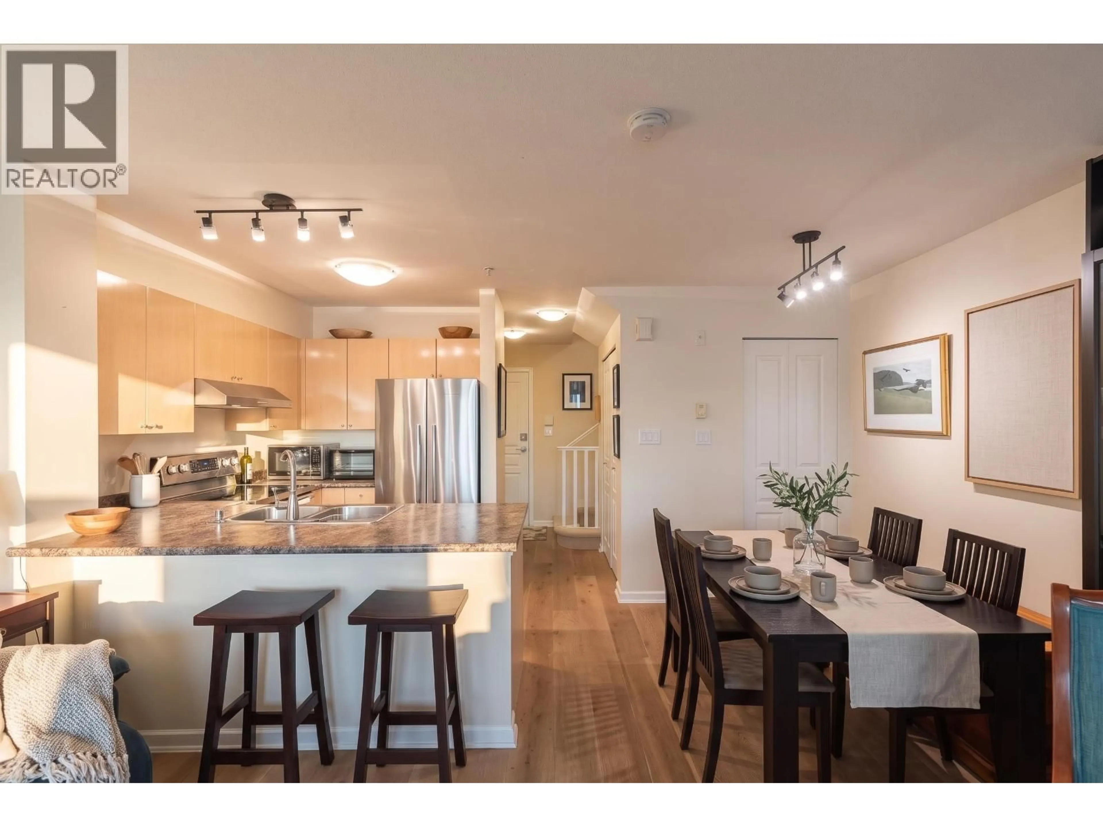 Open concept kitchen, wood/laminate floor for 3228 HEATHER STREET, Vancouver British Columbia V5Z4R9