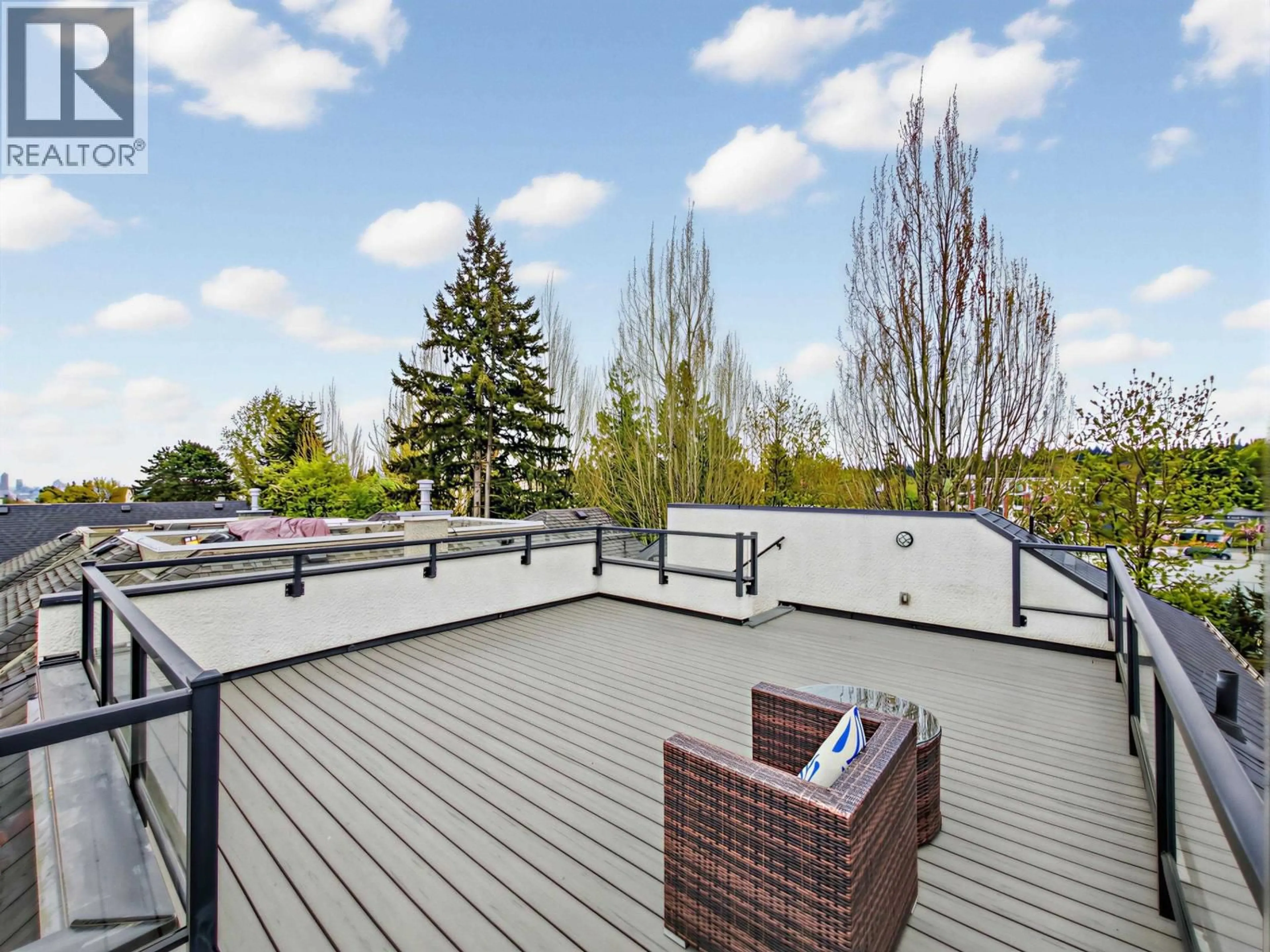 Patio, city buildings view from balcony for 4555 9TH AVENUE, Vancouver British Columbia V6R2E2