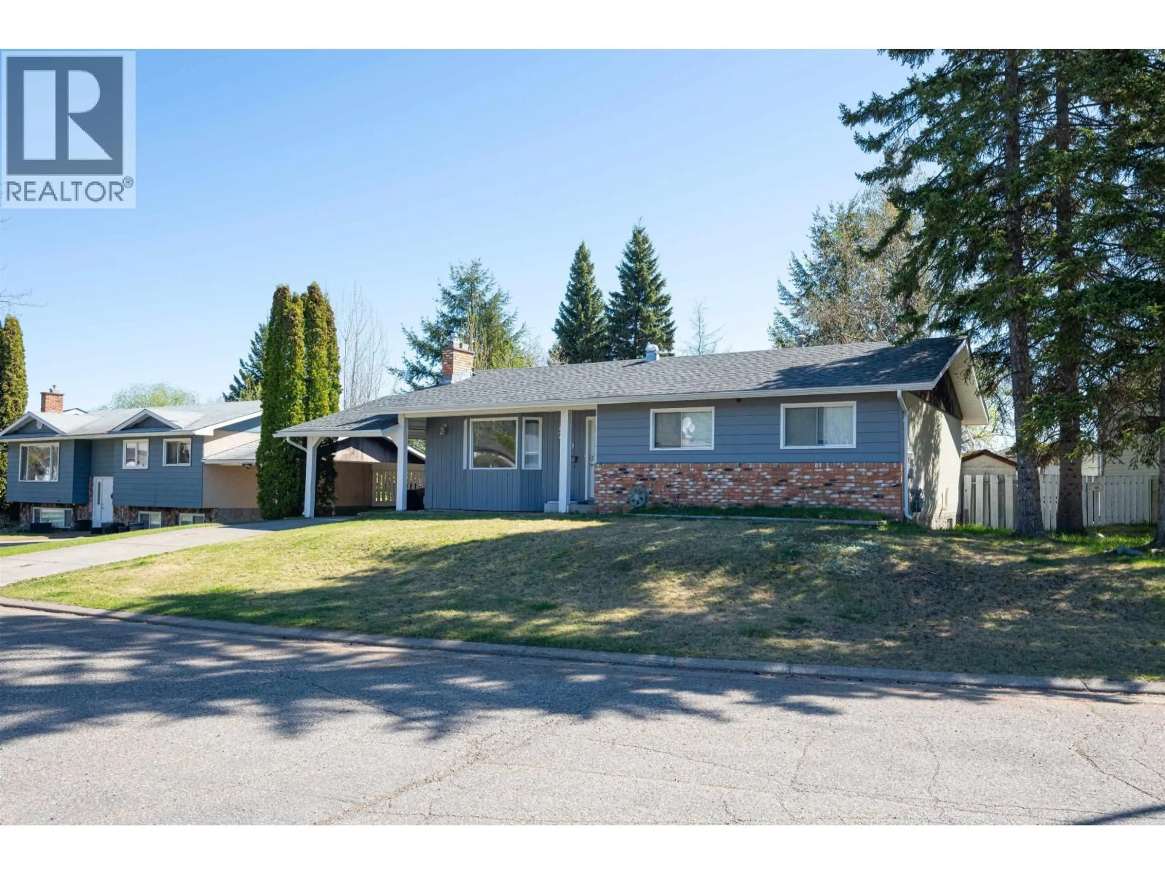 Home with vinyl exterior material, street for 730 FAULKNER CRESCENT, Prince George British Columbia V2M5C9