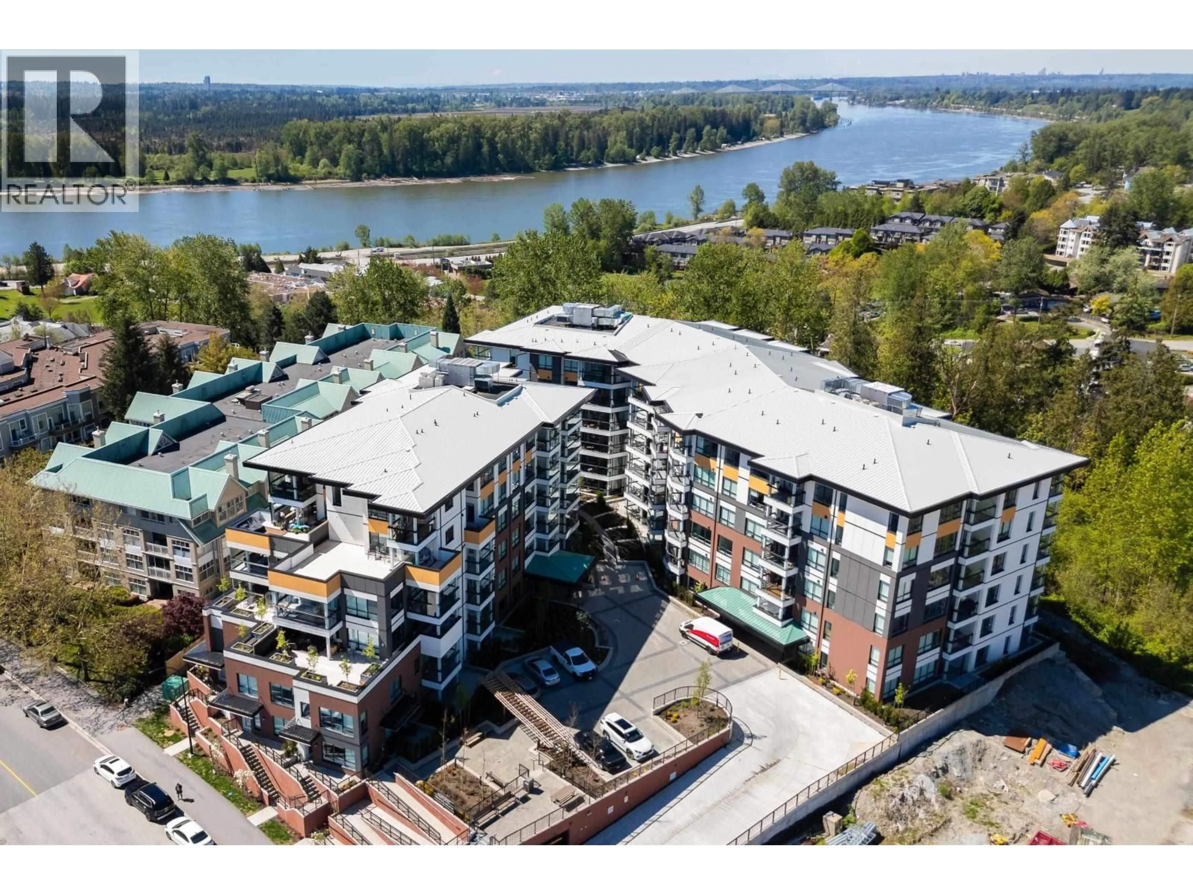 A pic from outside/outdoor area/front of a property/back of a property/a pic from drone, water/lake/river/ocean view for 401 - 11639 227 STREET, Maple Ridge British Columbia V2X9B2