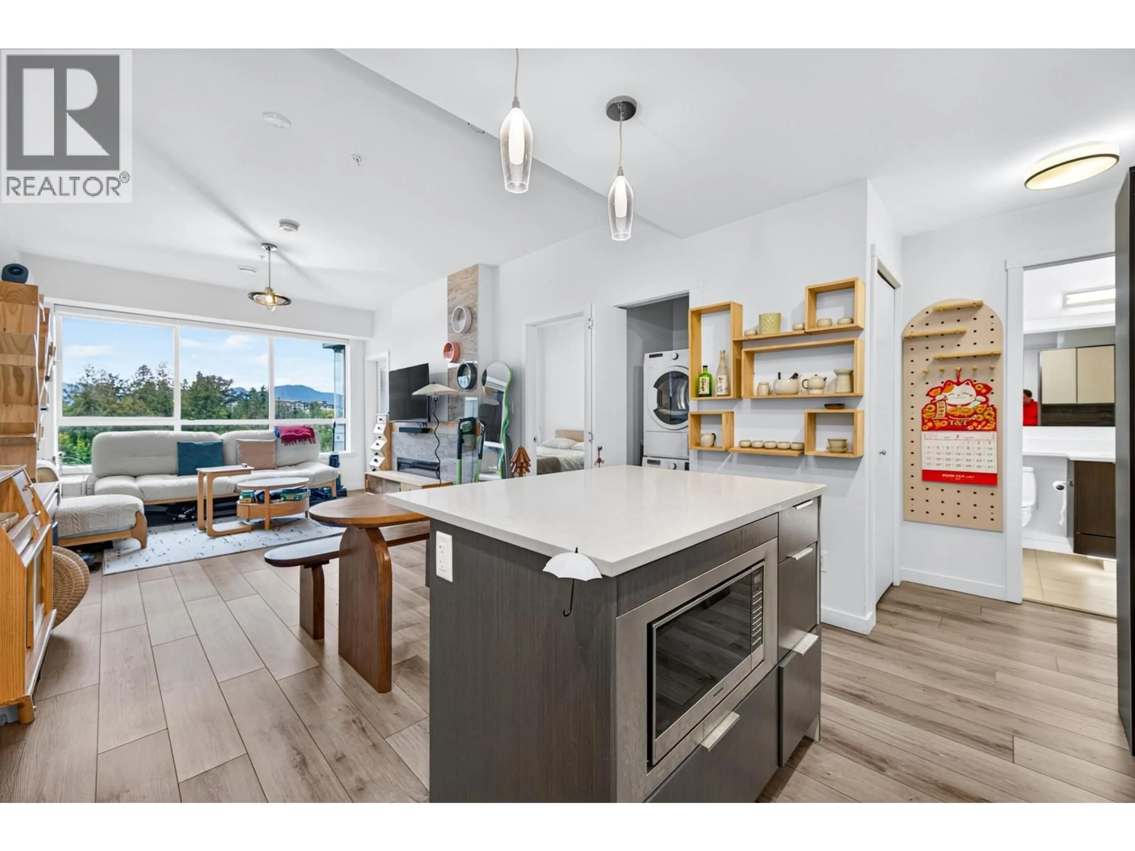 Open concept kitchen, wood/laminate floor for 401 - 11639 227 STREET, Maple Ridge British Columbia V2X9B2