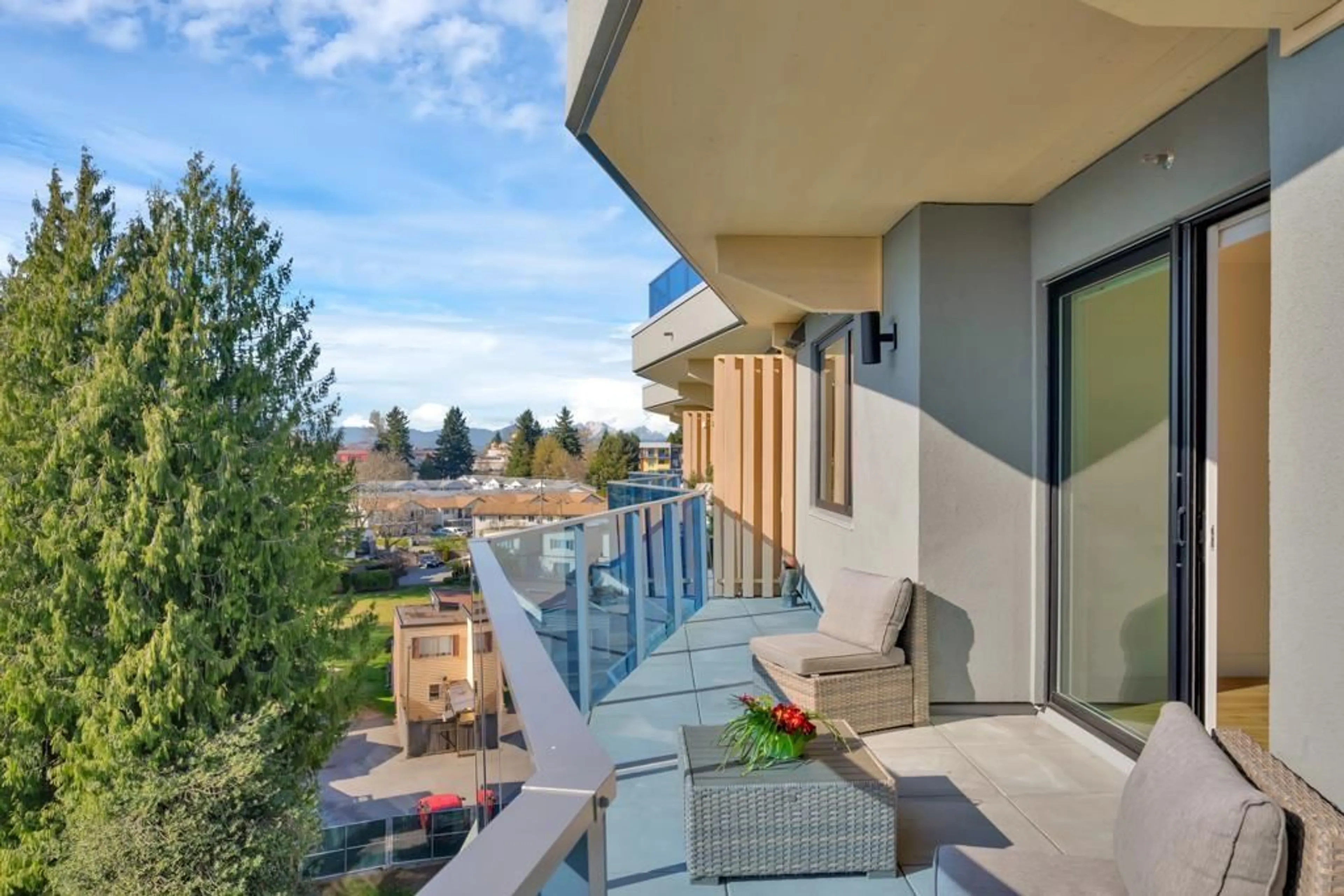 Patio, city buildings view from balcony for 505 - 33160 PLAXTON CRESCENT, Abbotsford British Columbia V2S0N6