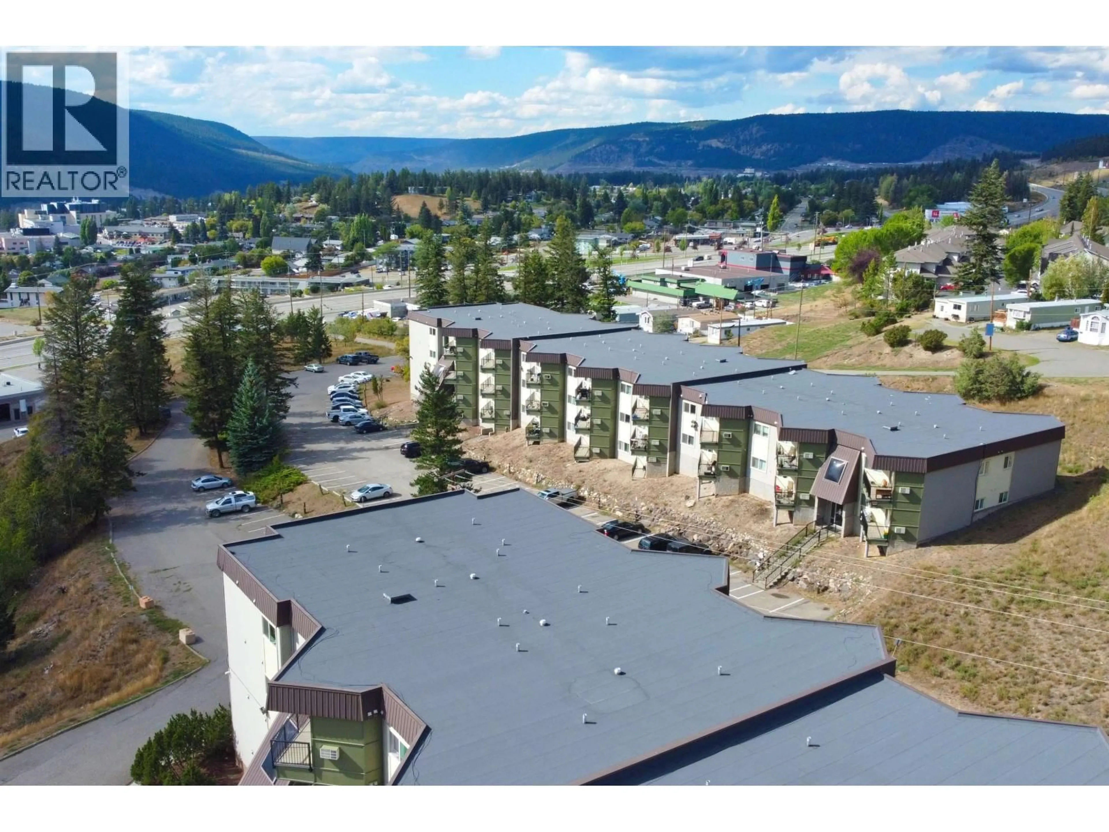 A pic from outside/outdoor area/front of a property/back of a property/a pic from drone, mountain view for 411 - 280 BROADWAY AVENUE, Williams Lake British Columbia V2G4J7