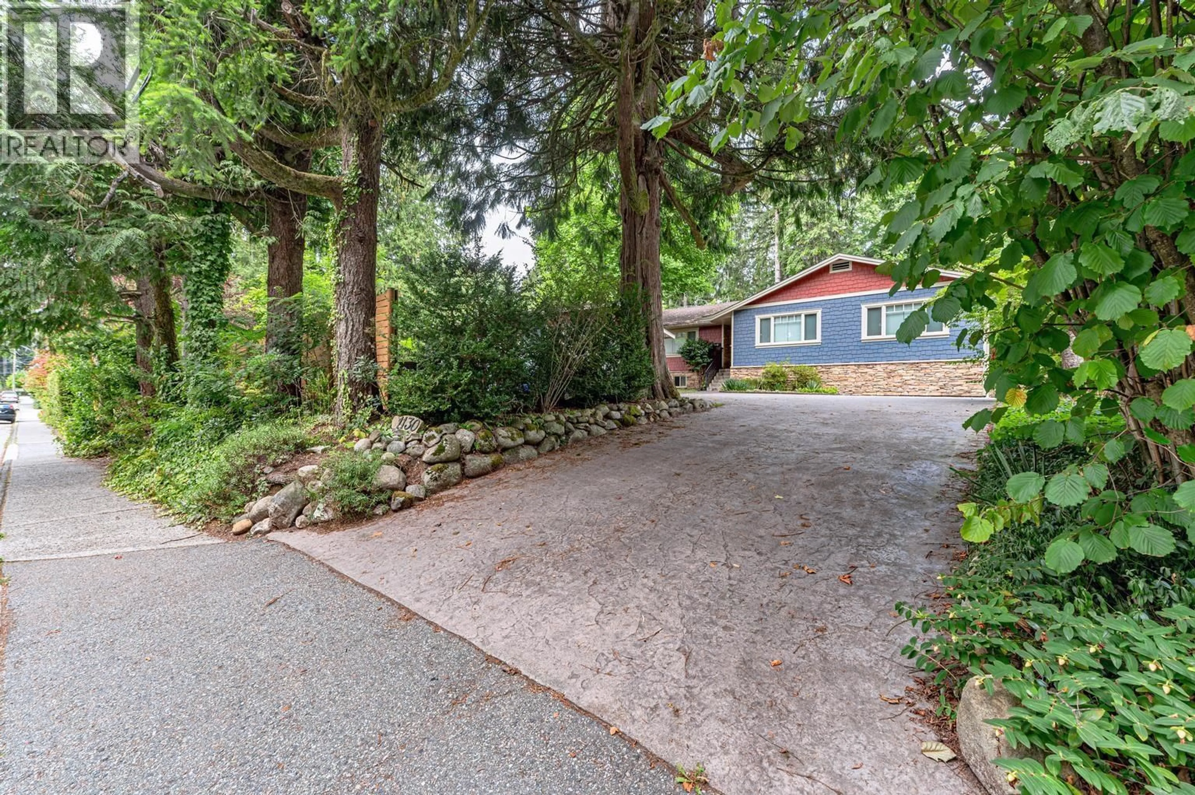 A pic from outside/outdoor area/front of a property/back of a property/a pic from drone, street for 1130 HANDSWORTH ROAD, North Vancouver British Columbia V7R2A8