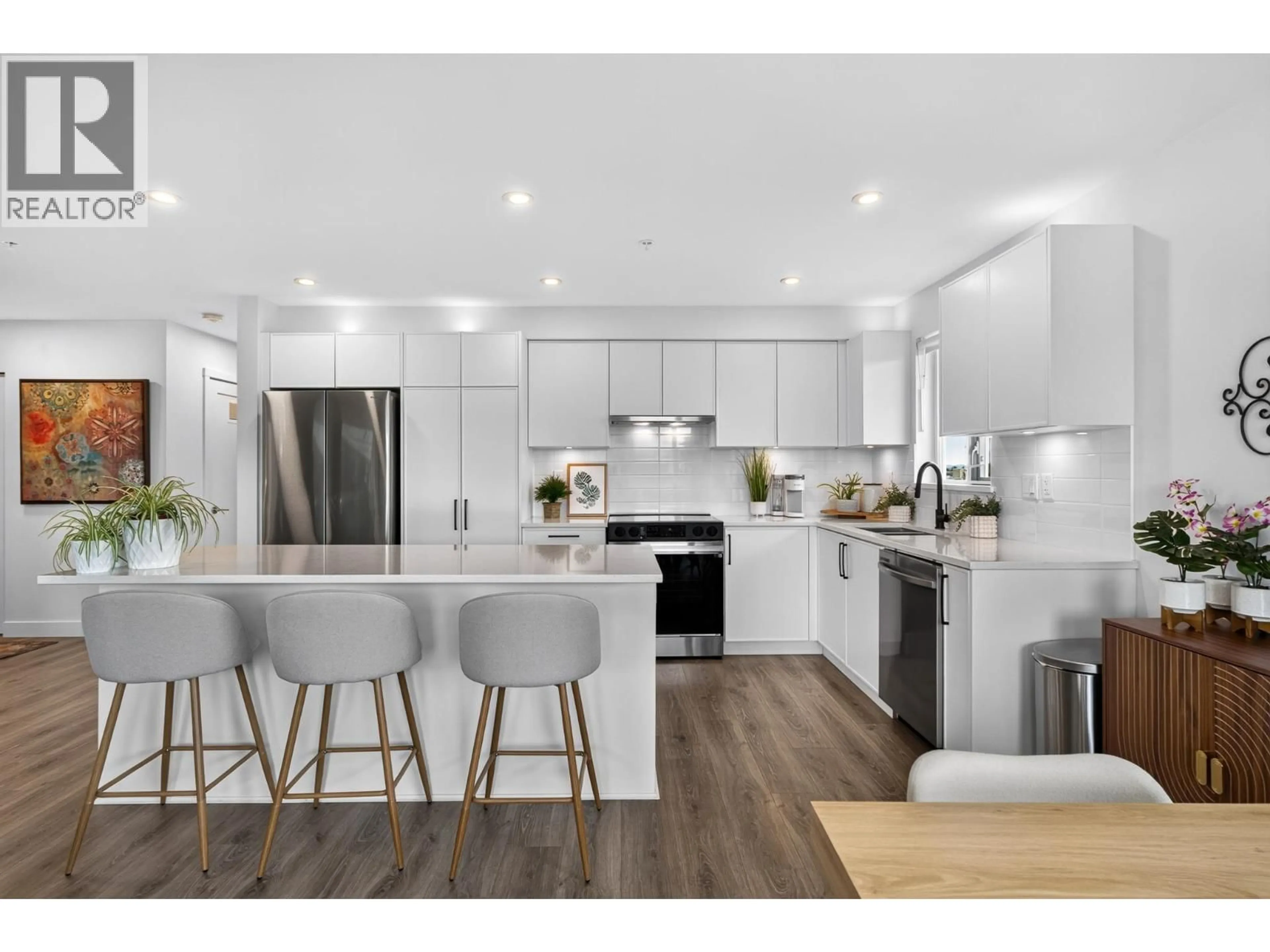 Open concept kitchen, wood/laminate floor for 503 - 22575 BROWN AVENUE, Maple Ridge British Columbia V2X6W2