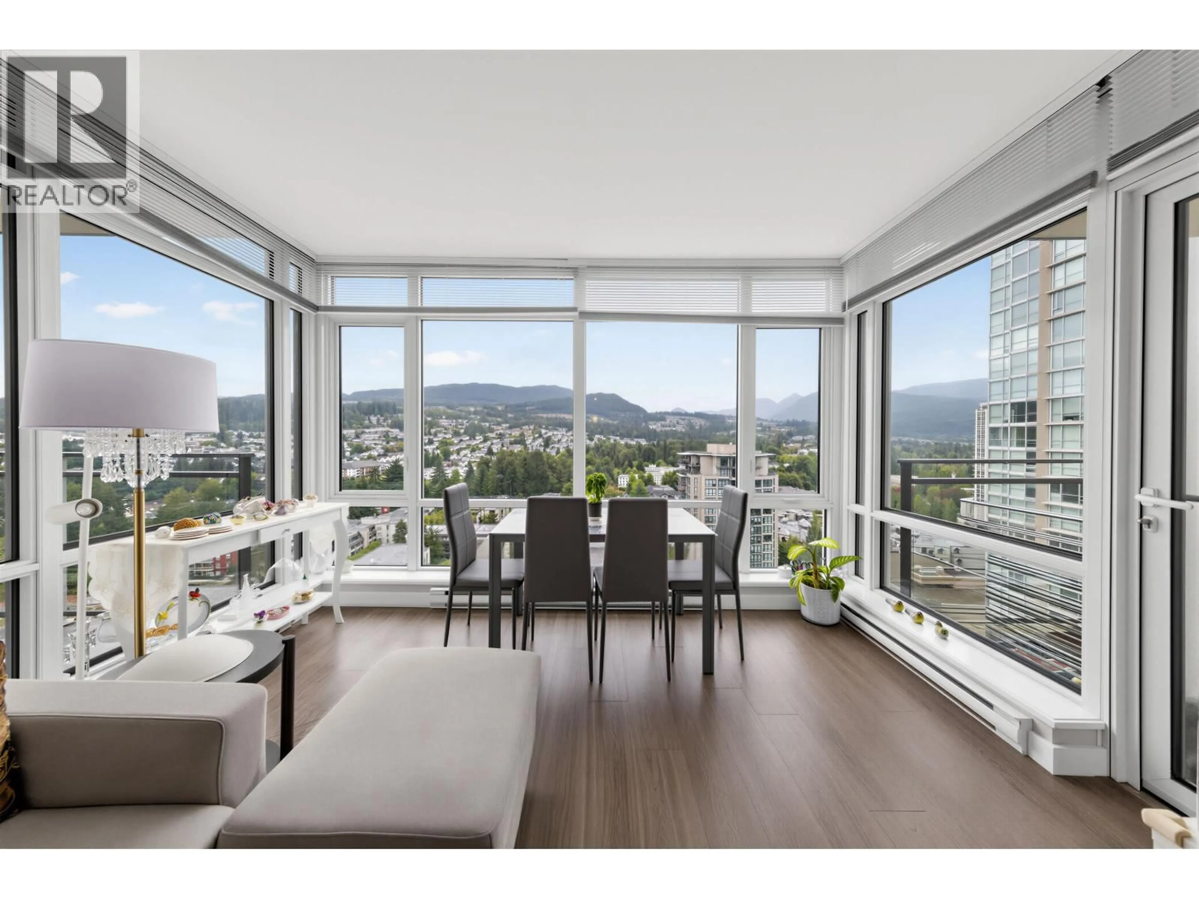 Living room with furniture, wood/laminate floor for 2301 - 2955 ATLANTIC AVENUE, Coquitlam British Columbia V3B0H9