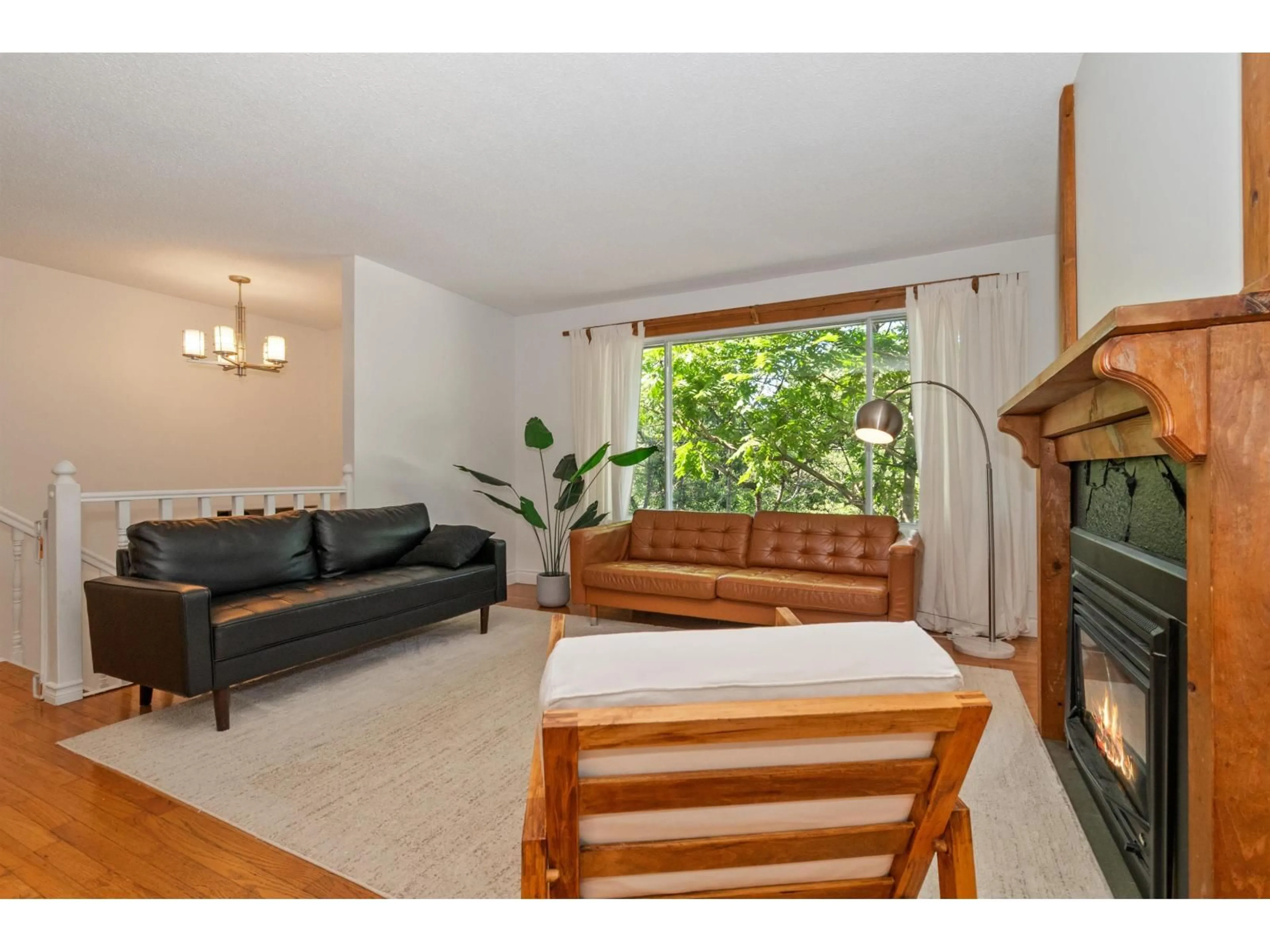Living room with furniture, wood/laminate floor for 43810 VEDDER MOUNTAIN ROAD, Chilliwack British Columbia V2R4C5