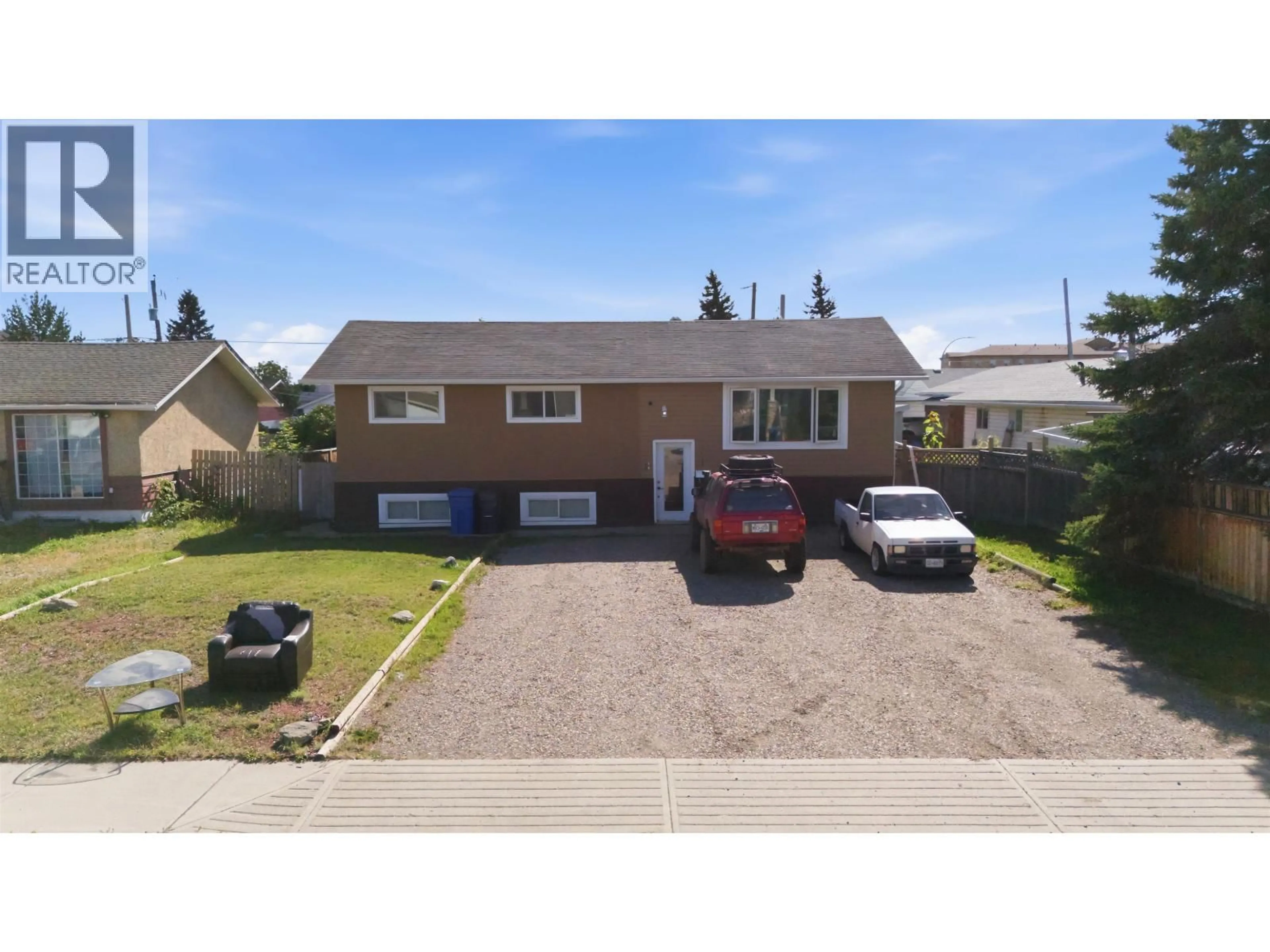 A pic from outside/outdoor area/front of a property/back of a property/a pic from drone, street for 11115 102 AVENUE, Fort St. John British Columbia V1J2G2