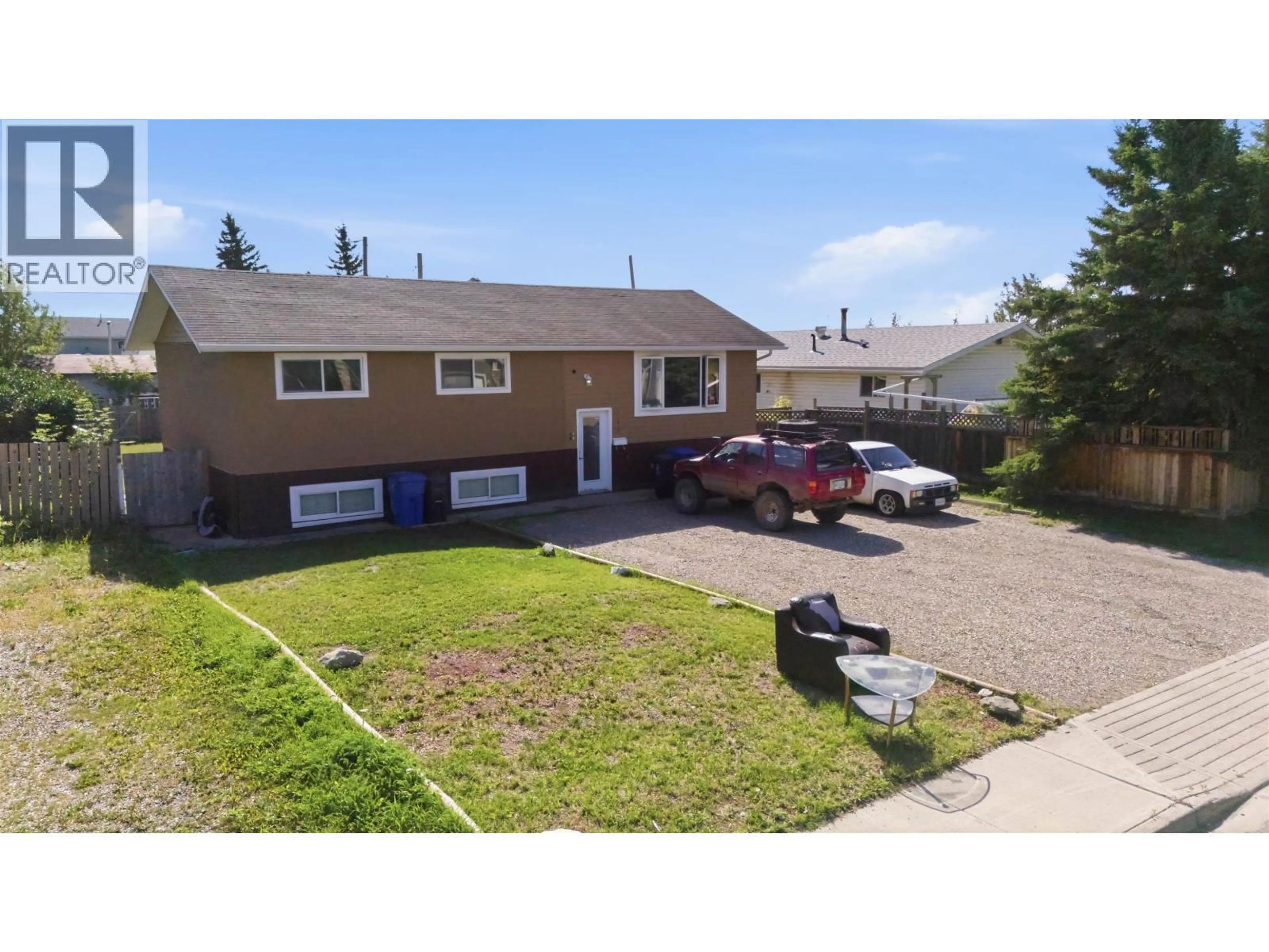 A pic from outside/outdoor area/front of a property/back of a property/a pic from drone, street for 11115 102 AVENUE, Fort St. John British Columbia V1J2G2