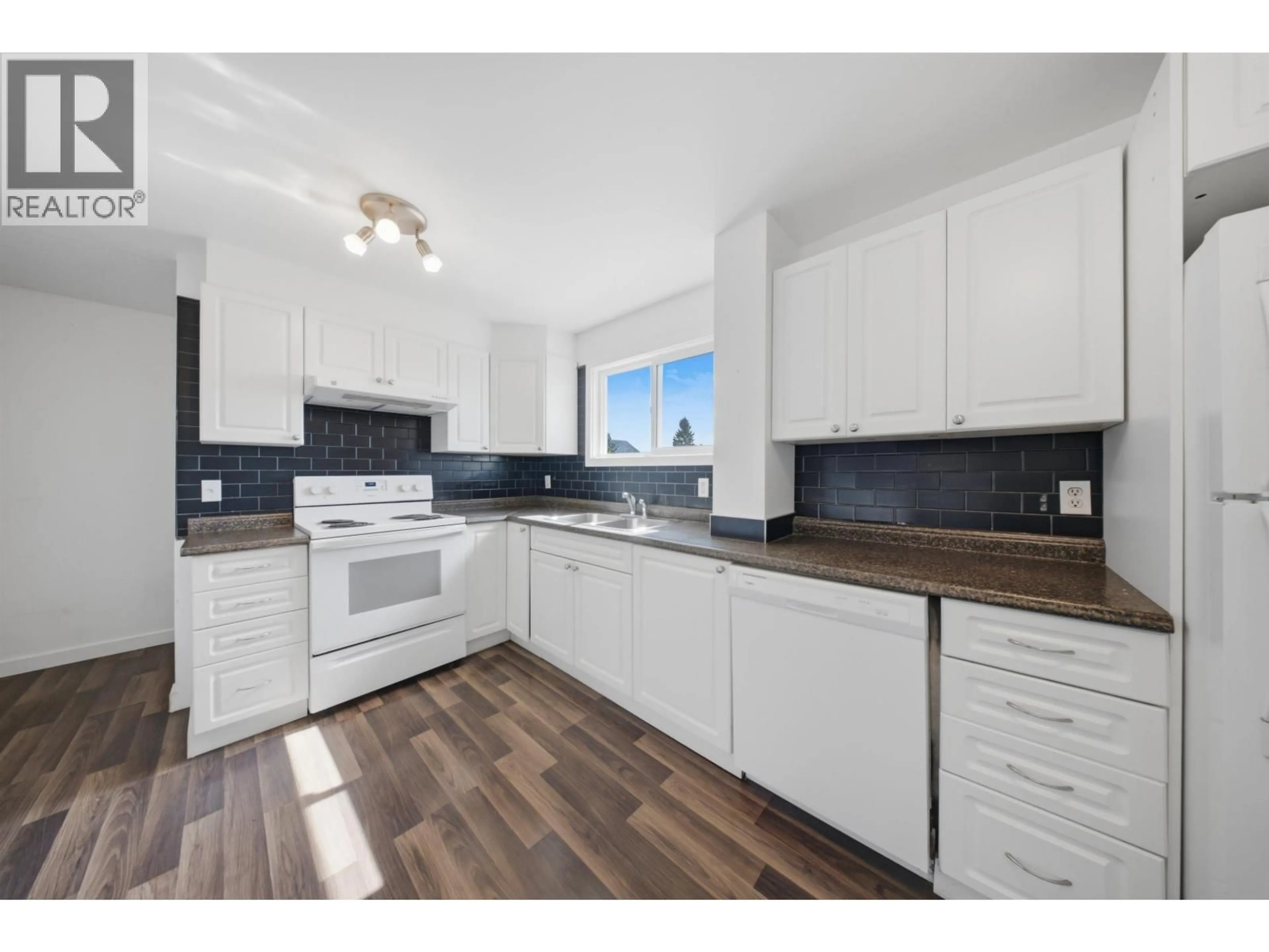Open concept kitchen, unknown for 11115 102 AVENUE, Fort St. John British Columbia V1J2G2
