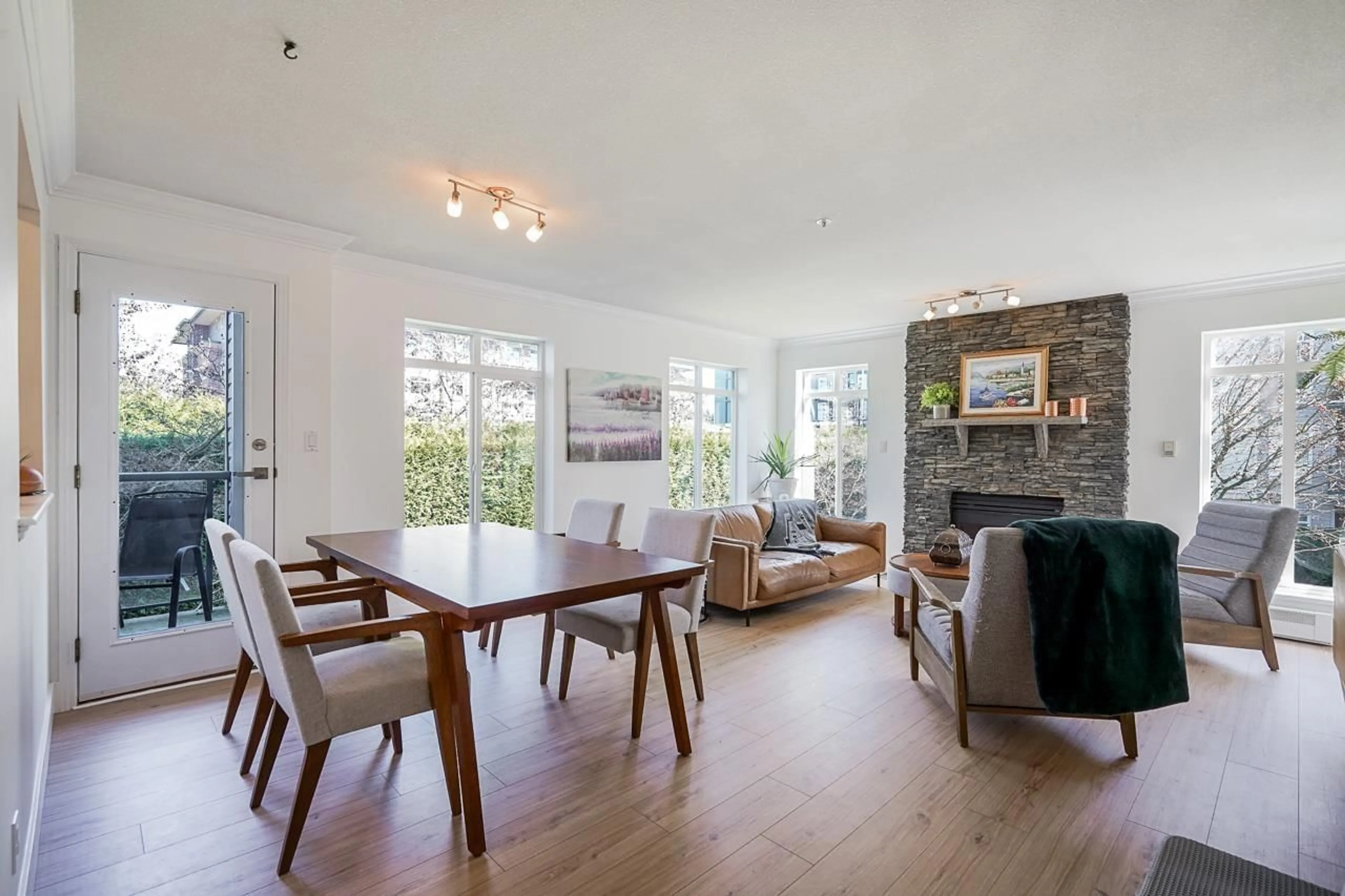 Dining room, wood/laminate floor for 208 - 32075 GEORGE FERGUSON WAY, Abbotsford British Columbia V2T2K7
