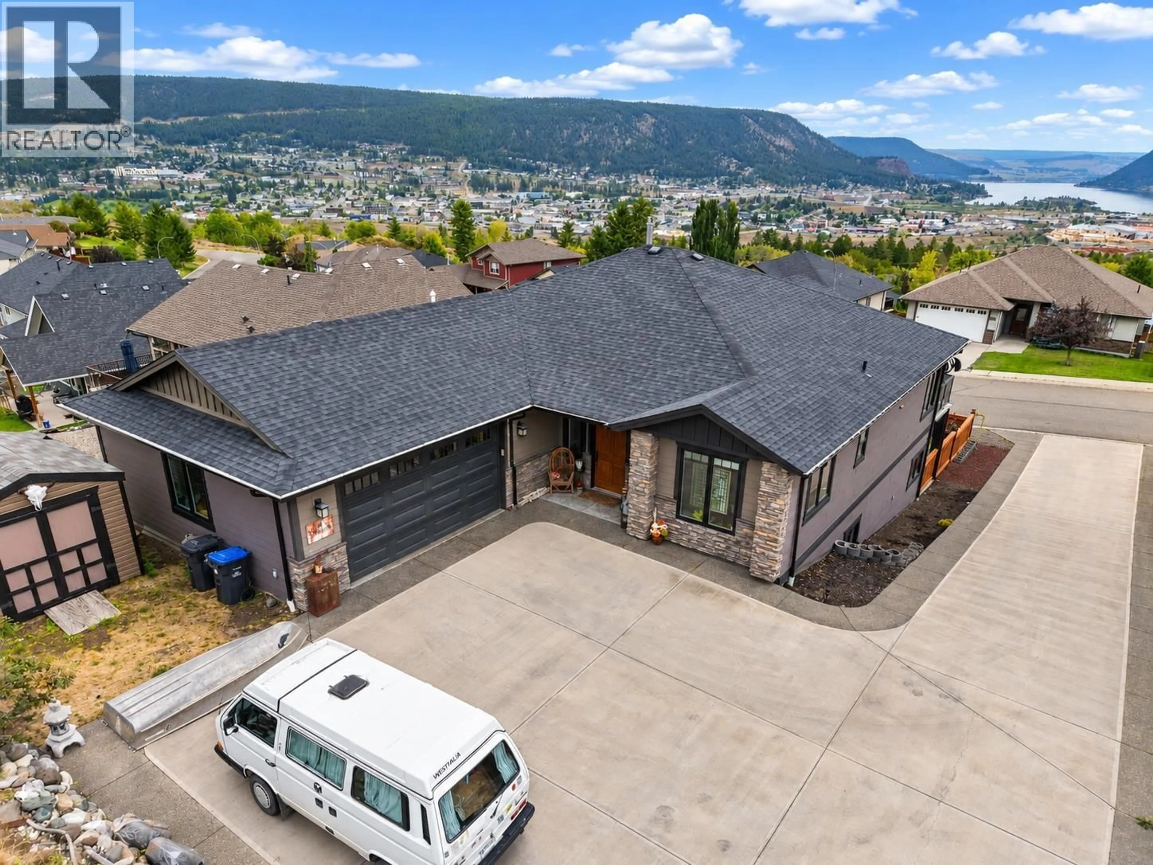 A pic from outside/outdoor area/front of a property/back of a property/a pic from drone, mountain view for 335 MANDARINO PLACE, Williams Lake British Columbia V2G5J1