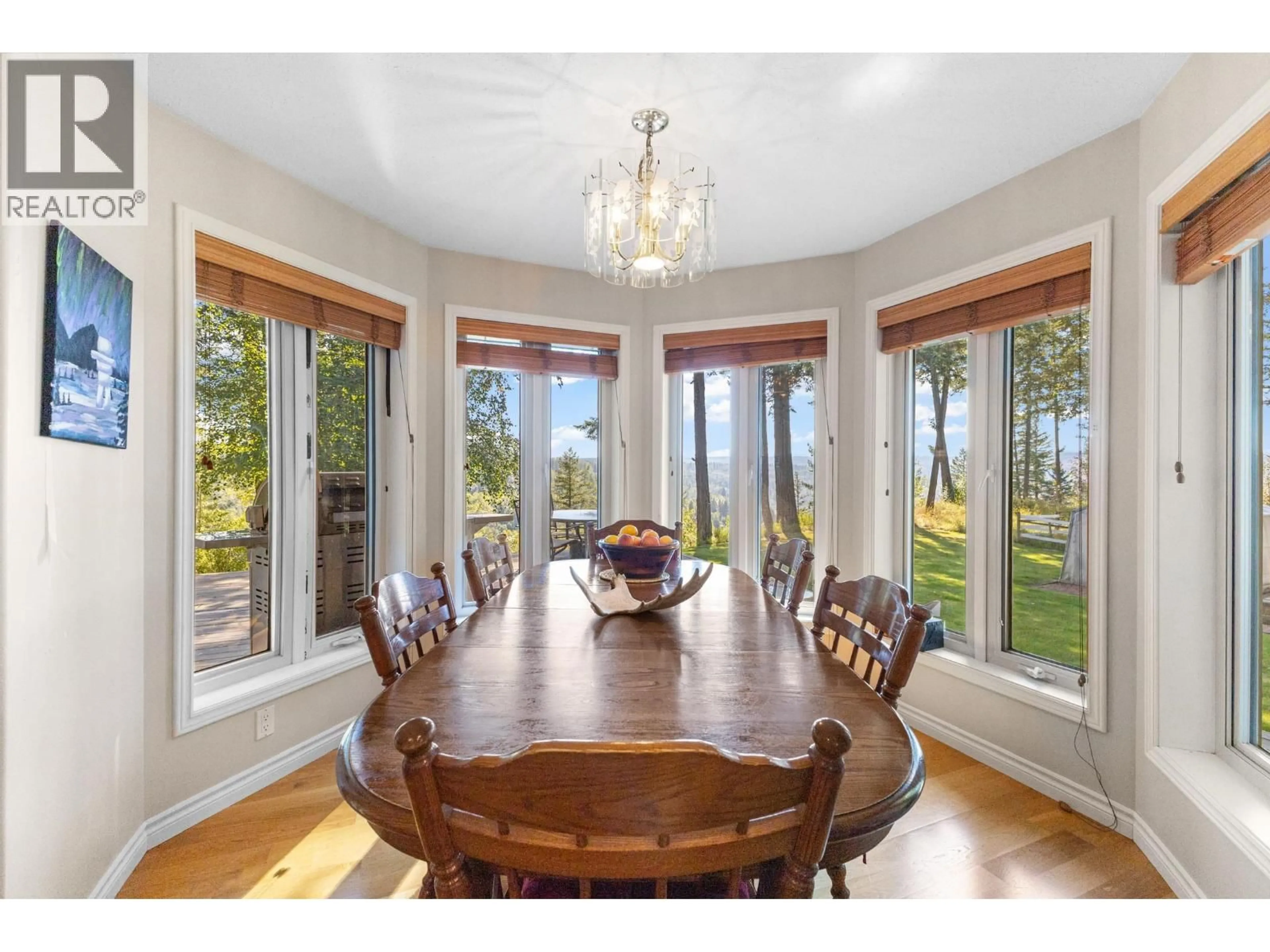 Dining room, wood/laminate floor for 1897 DRAGON HILL ROAD, Quesnel British Columbia V2J4B9