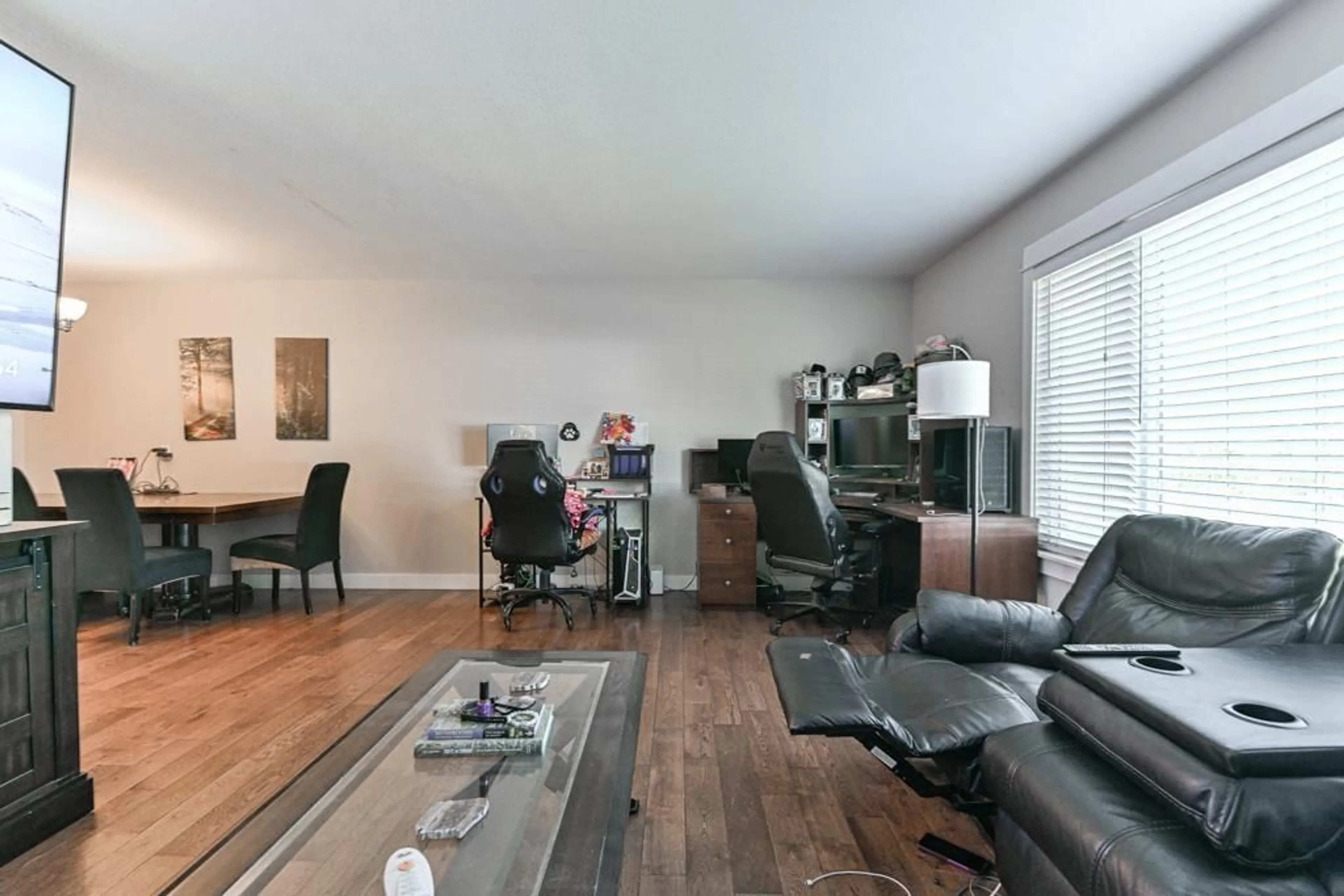 Living room with furniture, wood/laminate floor for 46512 BRICE ROAD, Chilliwack British Columbia V2P3V5