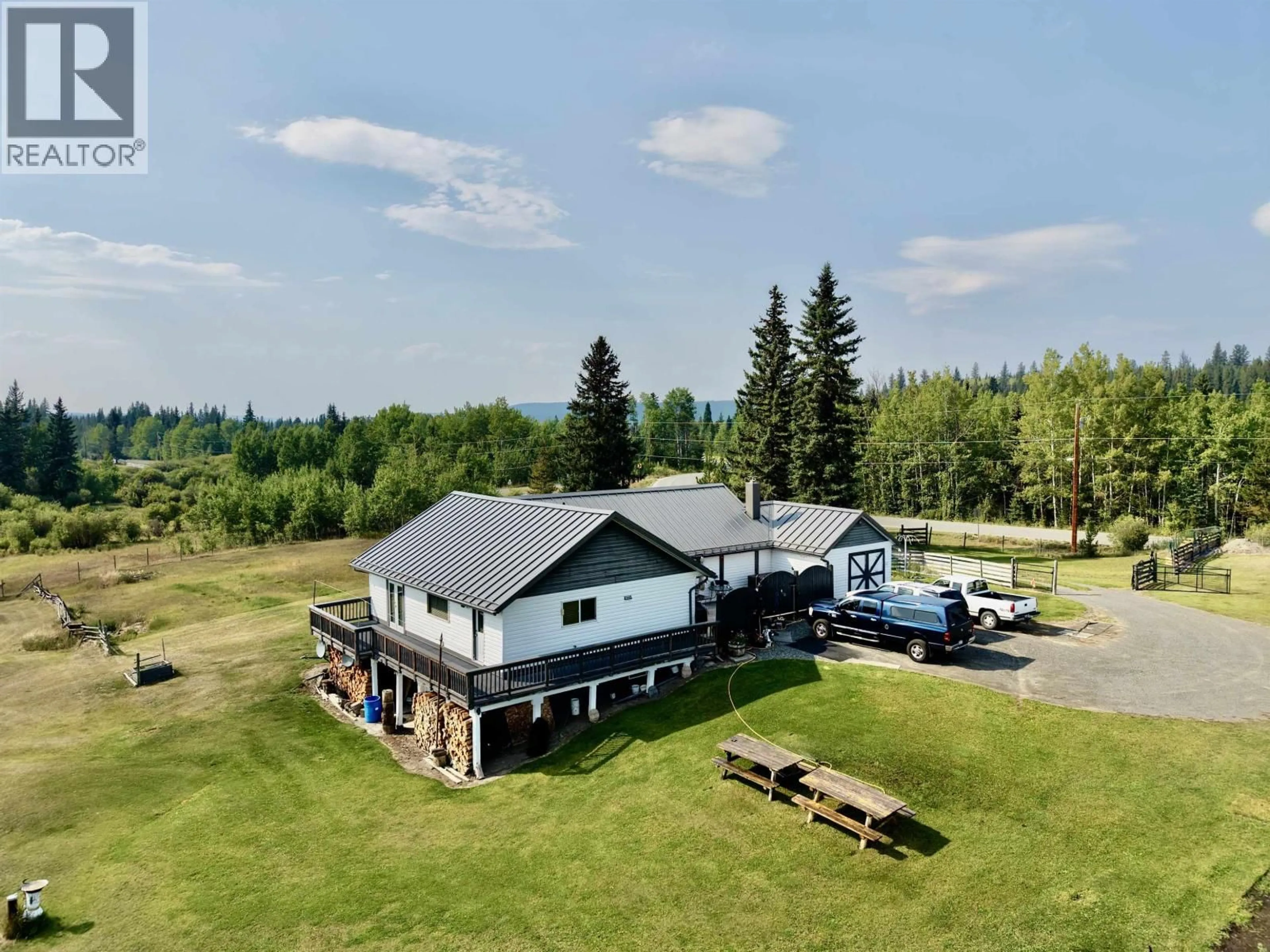 A pic from outside/outdoor area/front of a property/back of a property/a pic from drone, mountain view for 6630 FAWN CREEK ROAD, 100 Mile House British Columbia V0K2E0