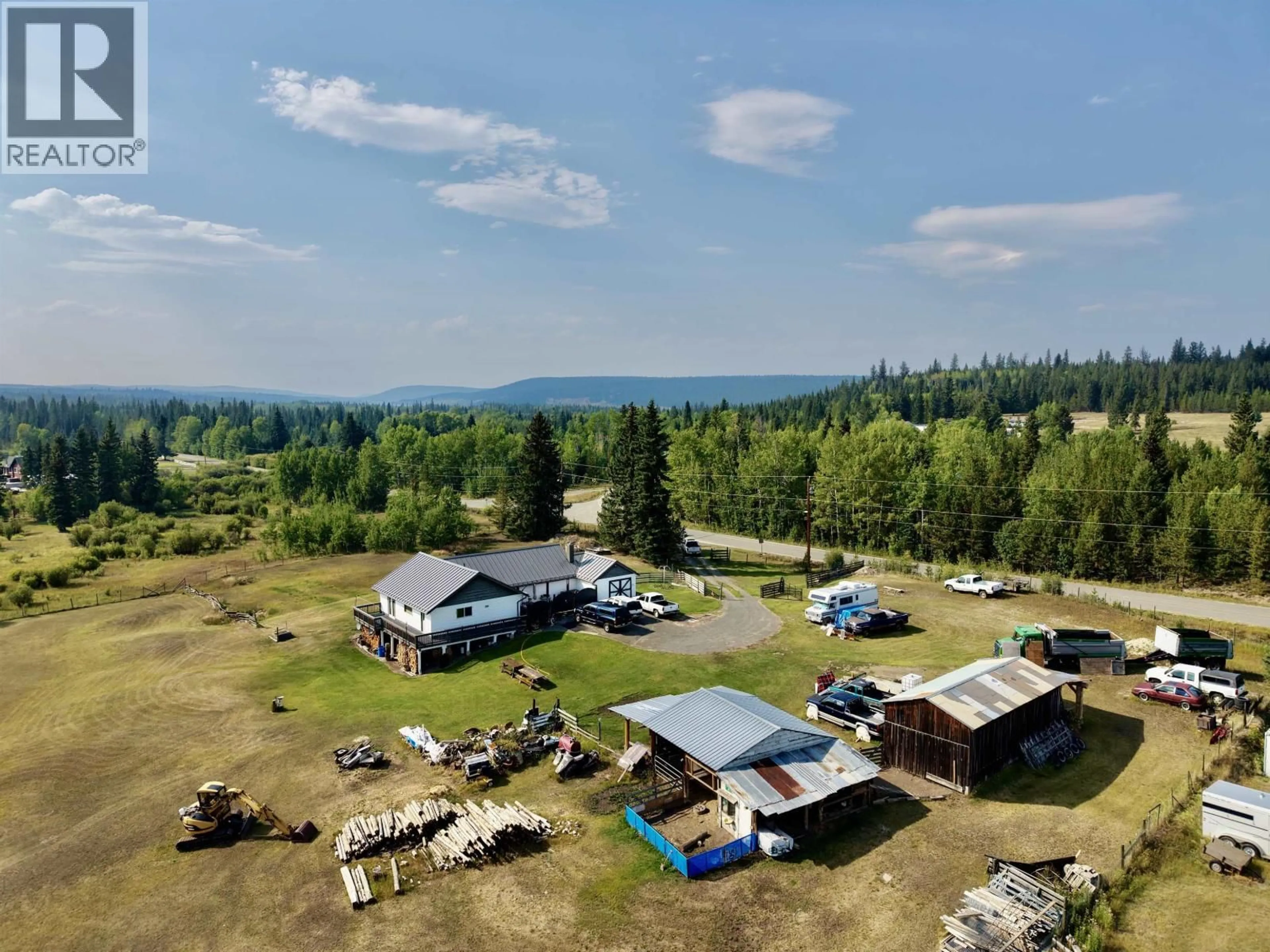 A pic from outside/outdoor area/front of a property/back of a property/a pic from drone, mountain view for 6630 FAWN CREEK ROAD, 100 Mile House British Columbia V0K2E0