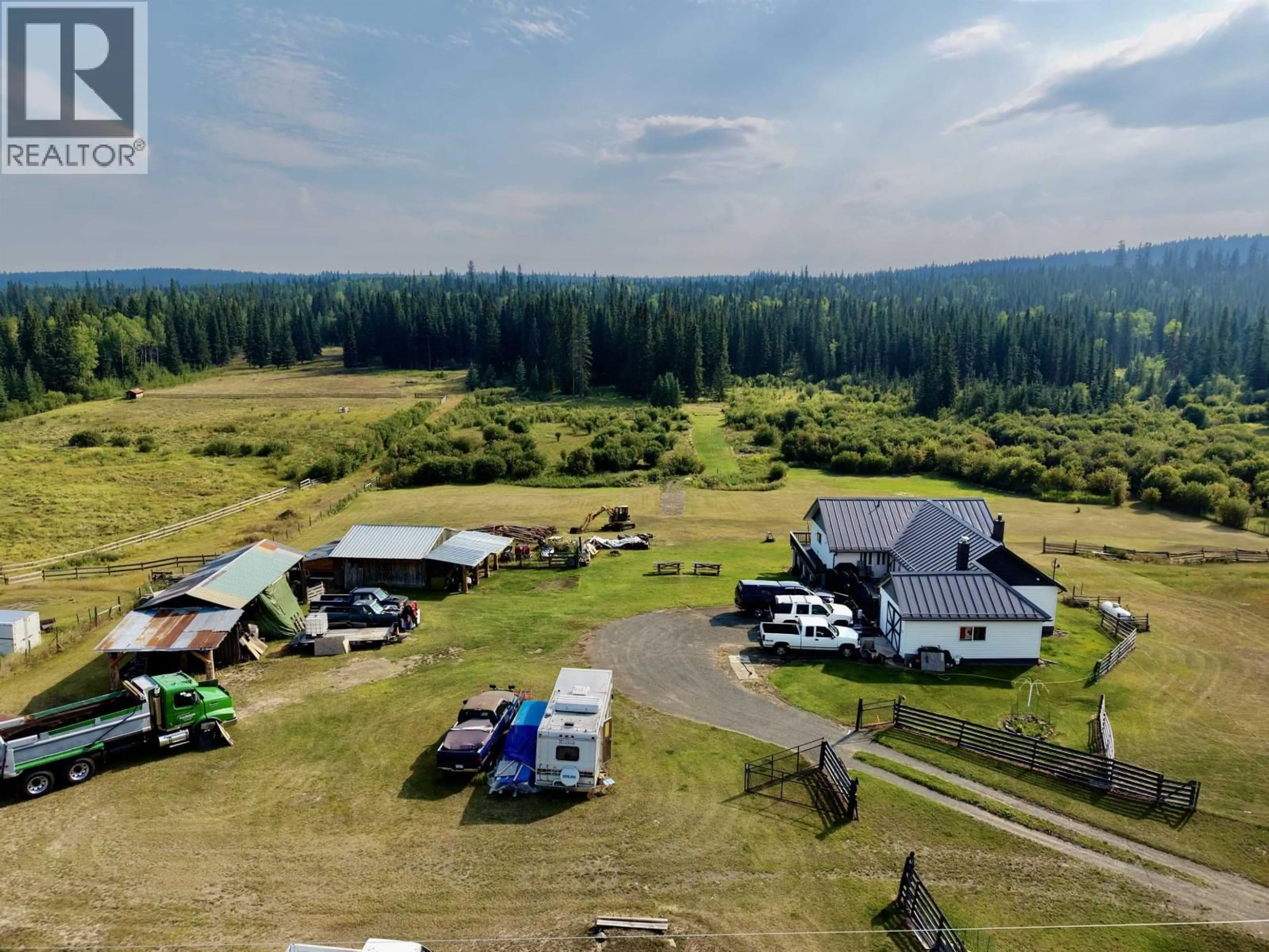 A pic from outside/outdoor area/front of a property/back of a property/a pic from drone, mountain view for 6630 FAWN CREEK ROAD, 100 Mile House British Columbia V0K2E0