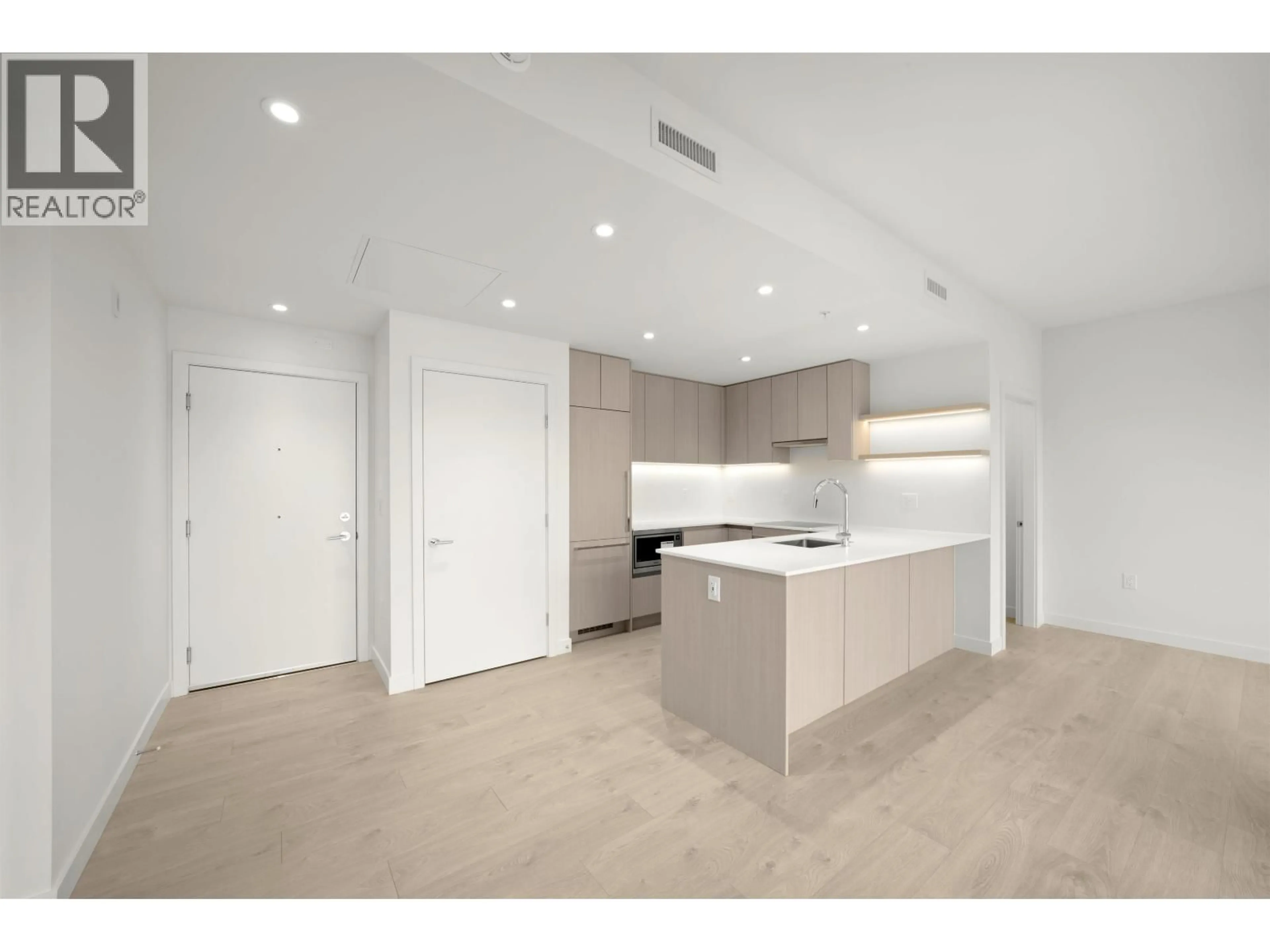Open concept kitchen, unknown for 408 - 4928 QUEBEC STREET, Vancouver British Columbia V5W0G6