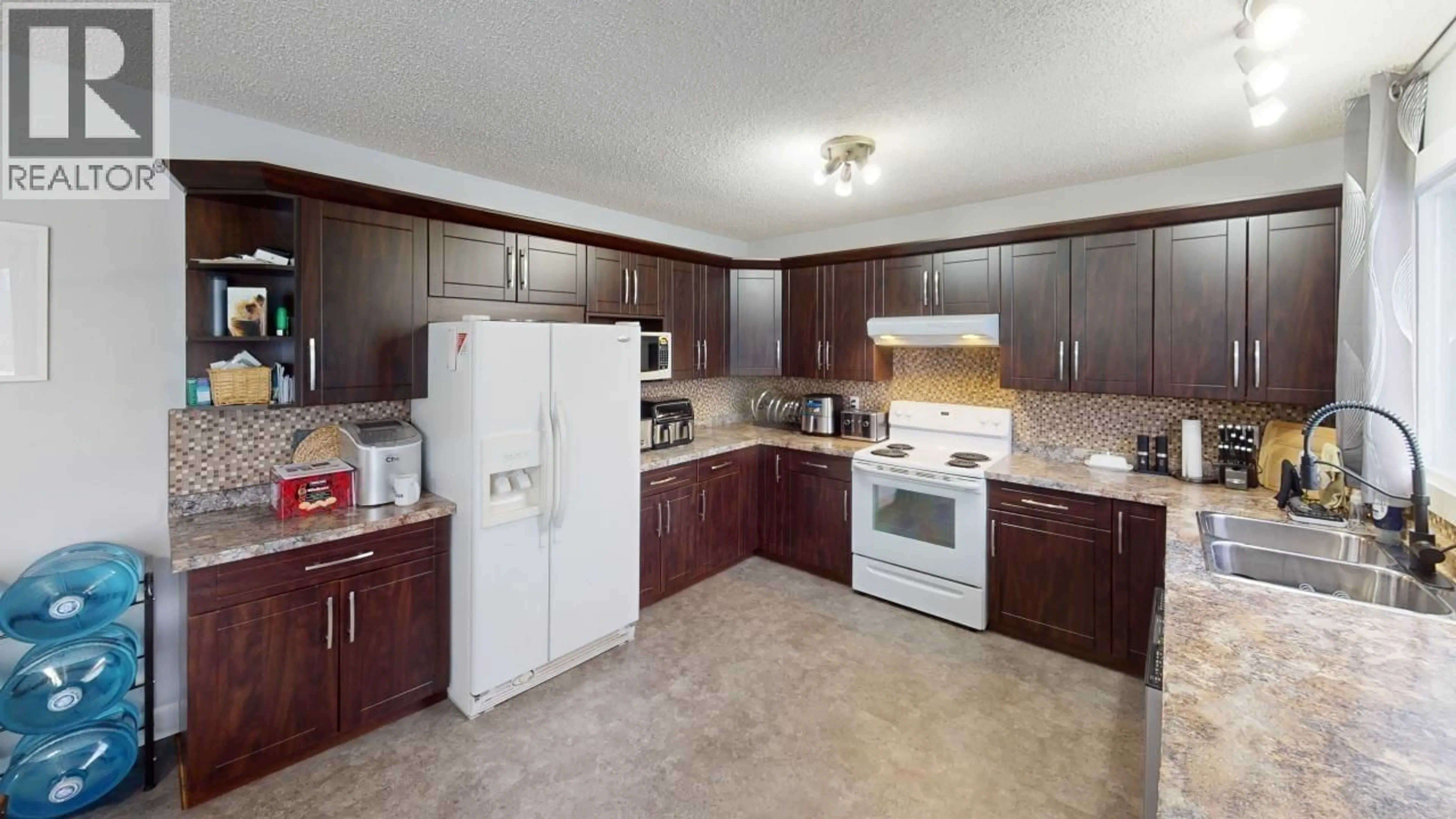 Standard kitchen, ceramic/tile floor for 11906 SHEPHERDS INN FRONTAGE ROAD, Fort St. John British Columbia V0C1Y0