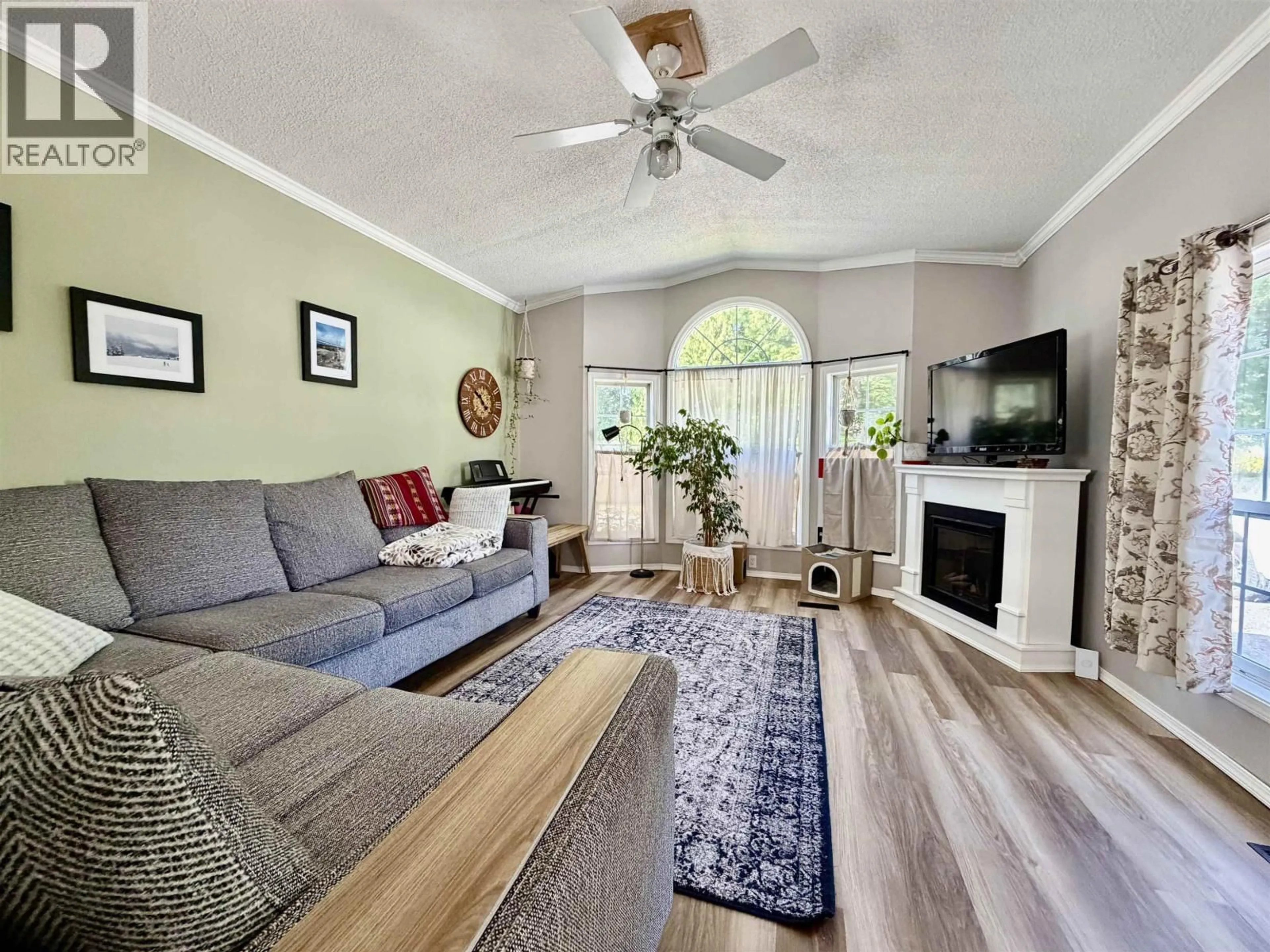 Living room with furniture, wood/laminate floor for 13 - 4625 GRAHAM AVENUE, Terrace British Columbia V8G1A6