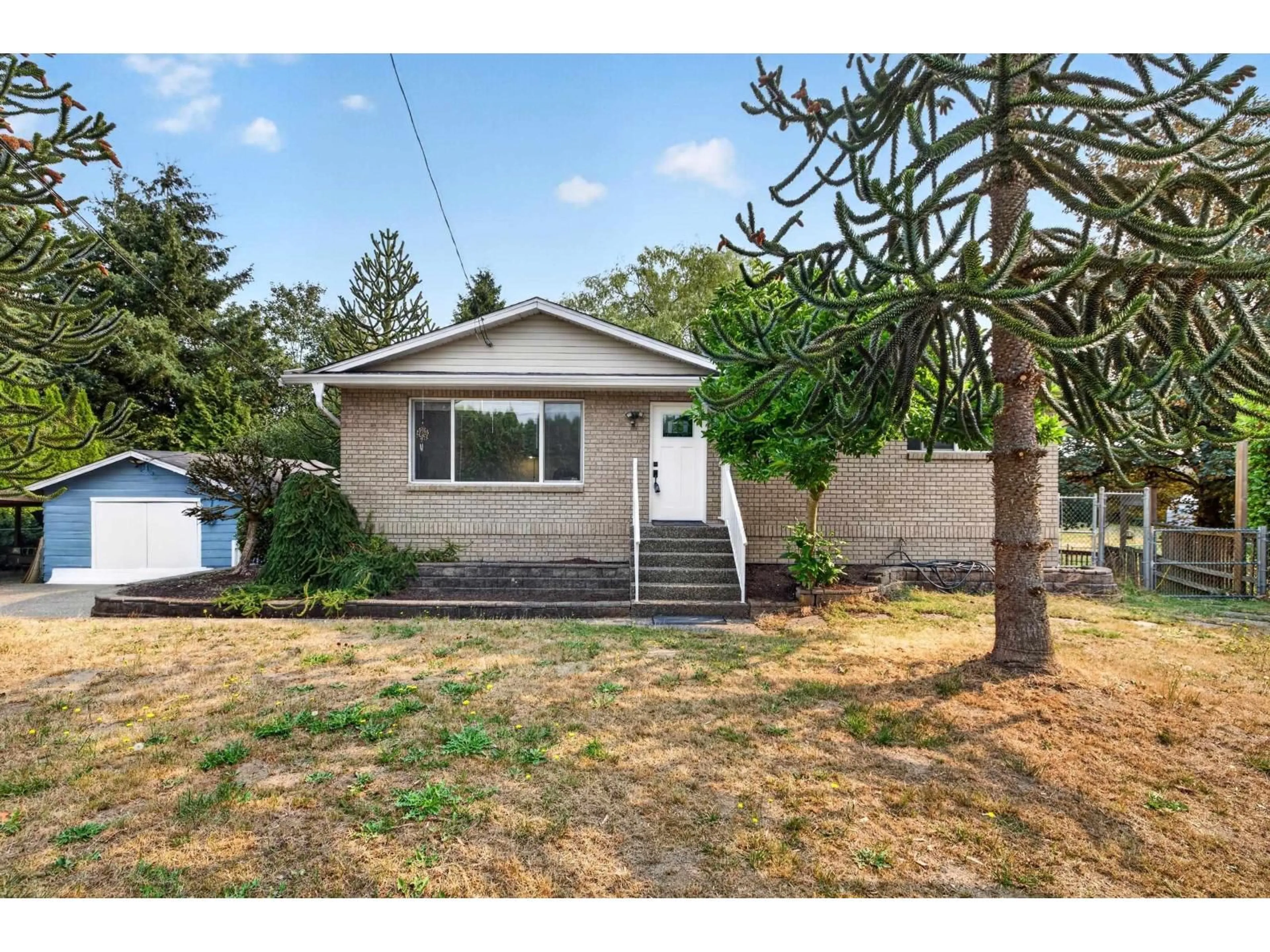 Home with vinyl exterior material, street for 21355 OLD YALE ROAD, Langley British Columbia V3A4M6