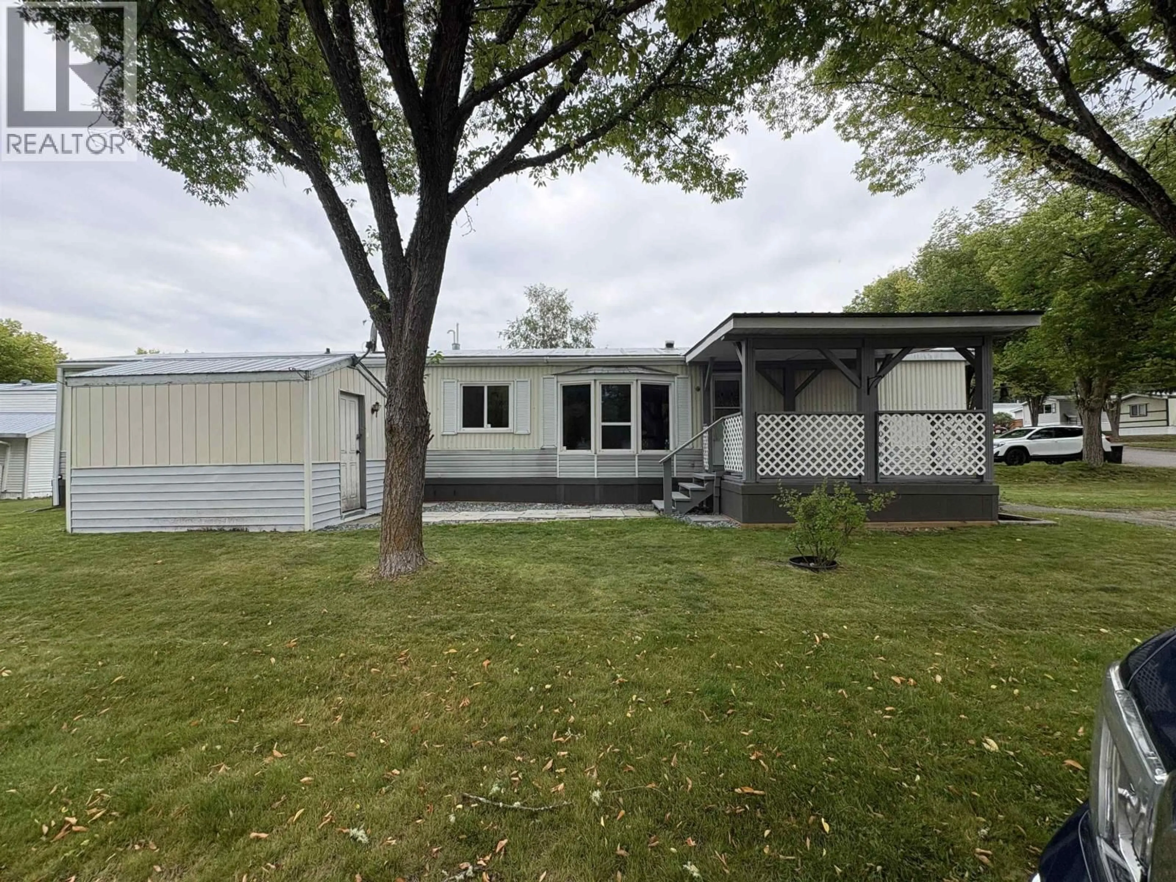 Home with vinyl exterior material, street for 102 - 1000 INVERNESS ROAD, Prince George British Columbia V2K4V1