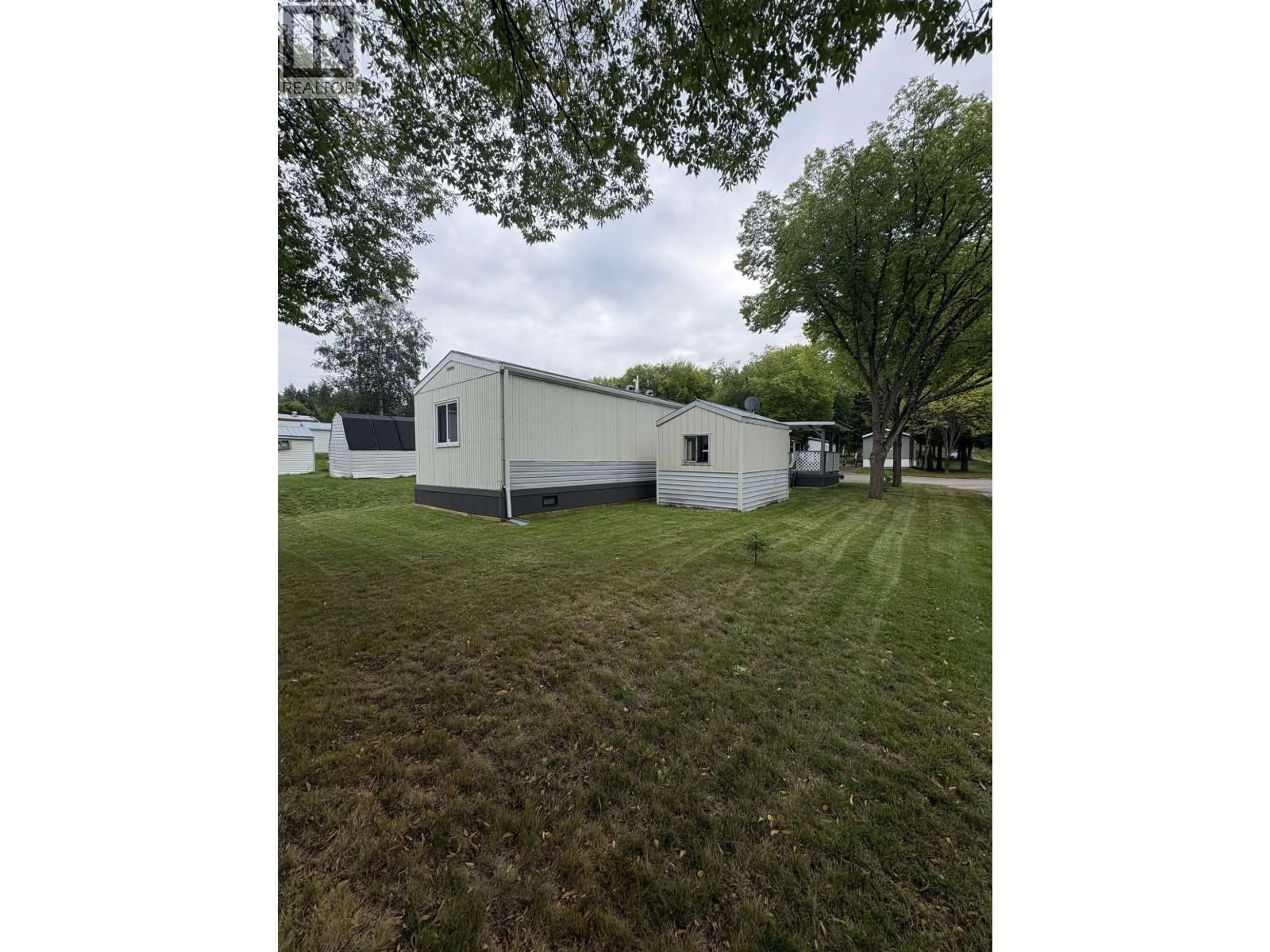 A pic from outside/outdoor area/front of a property/back of a property/a pic from drone, unknown for 102 - 1000 INVERNESS ROAD, Prince George British Columbia V2K4V1