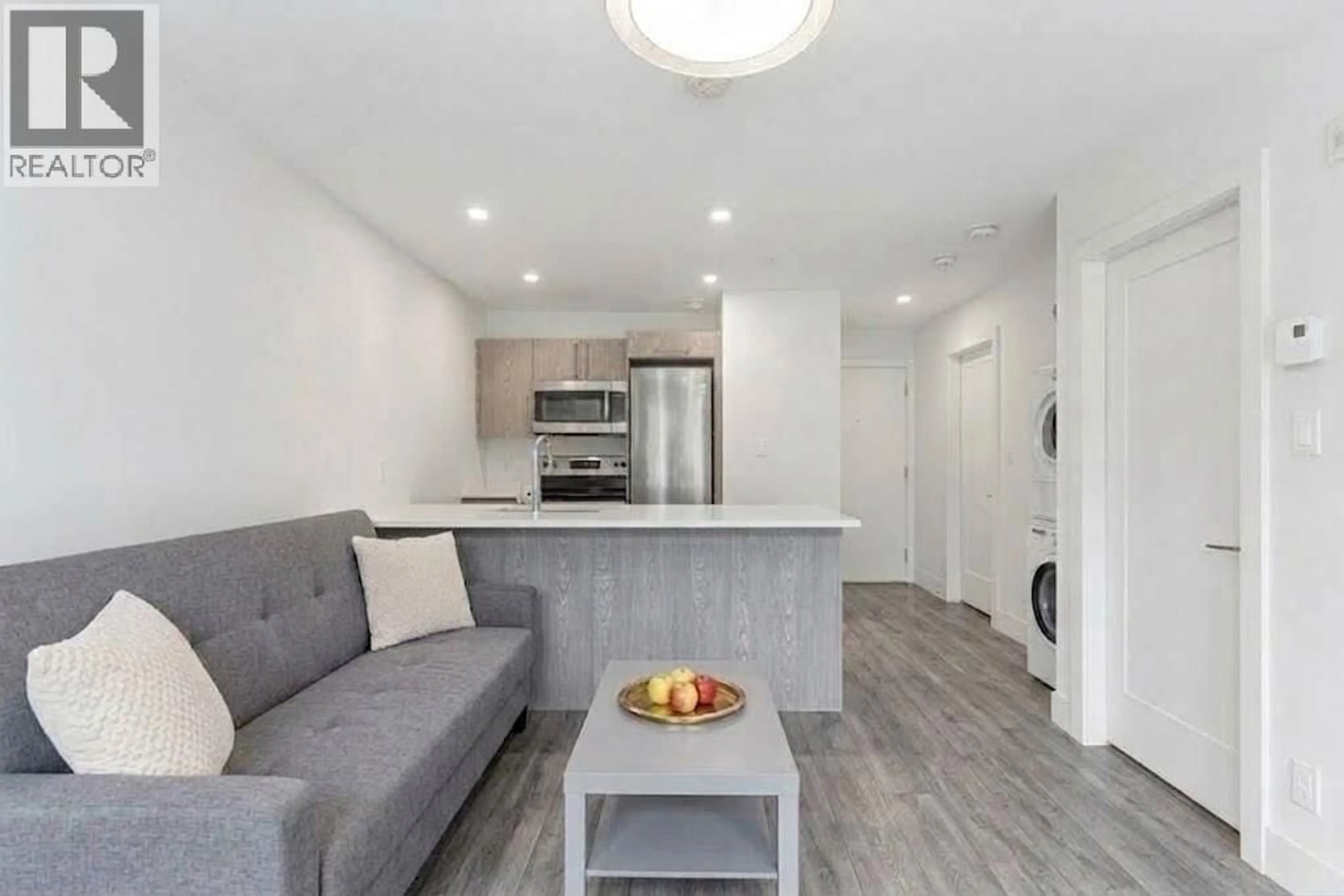 Open concept kitchen, wood/laminate floor for 314 - 7350 CRABAPPLE COURT, Pemberton British Columbia V0N2L1