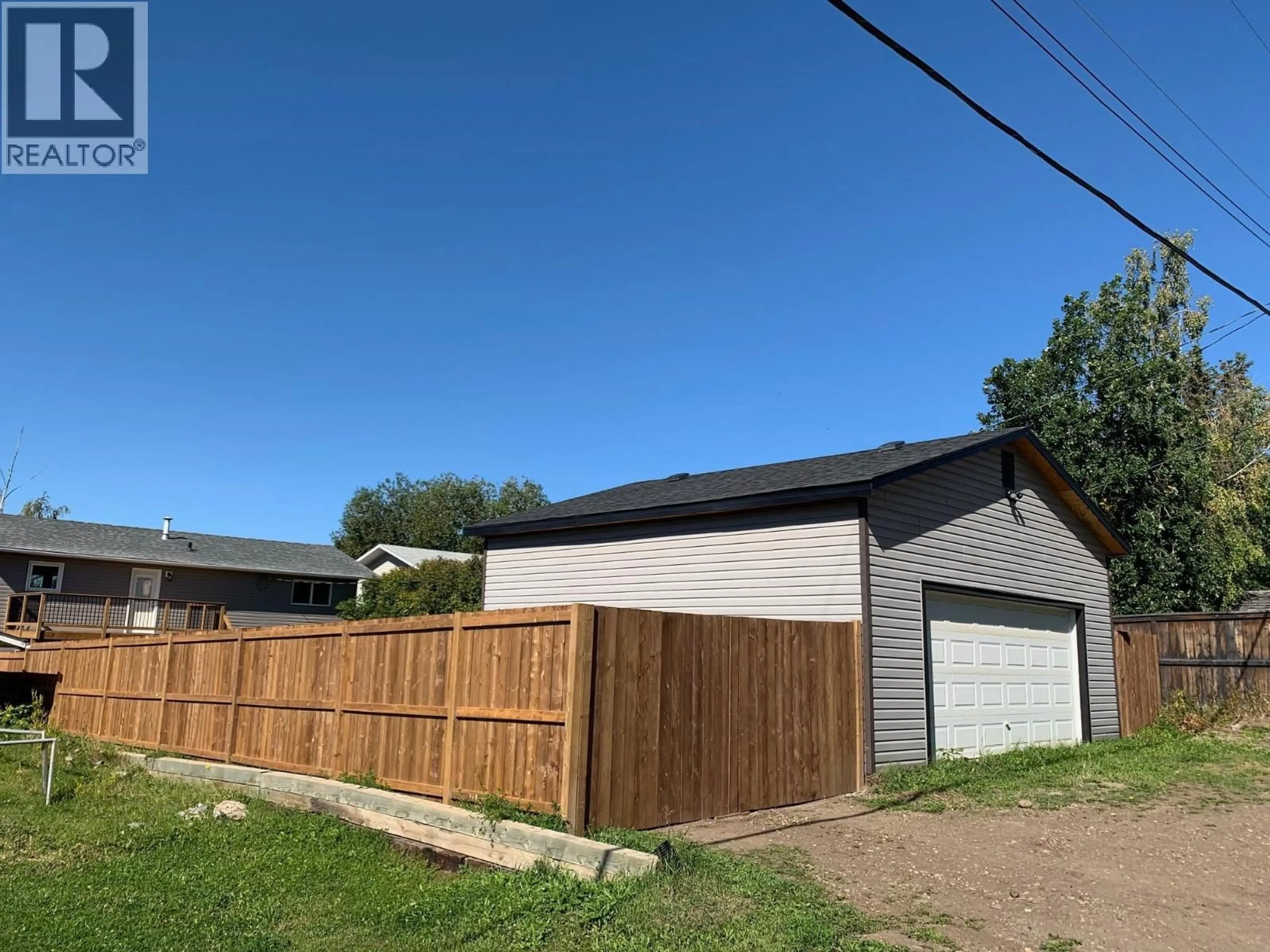 A pic from outside/outdoor area/front of a property/back of a property/a pic from drone, street for 9119 89 STREET, Fort St. John British Columbia V1J4Z3
