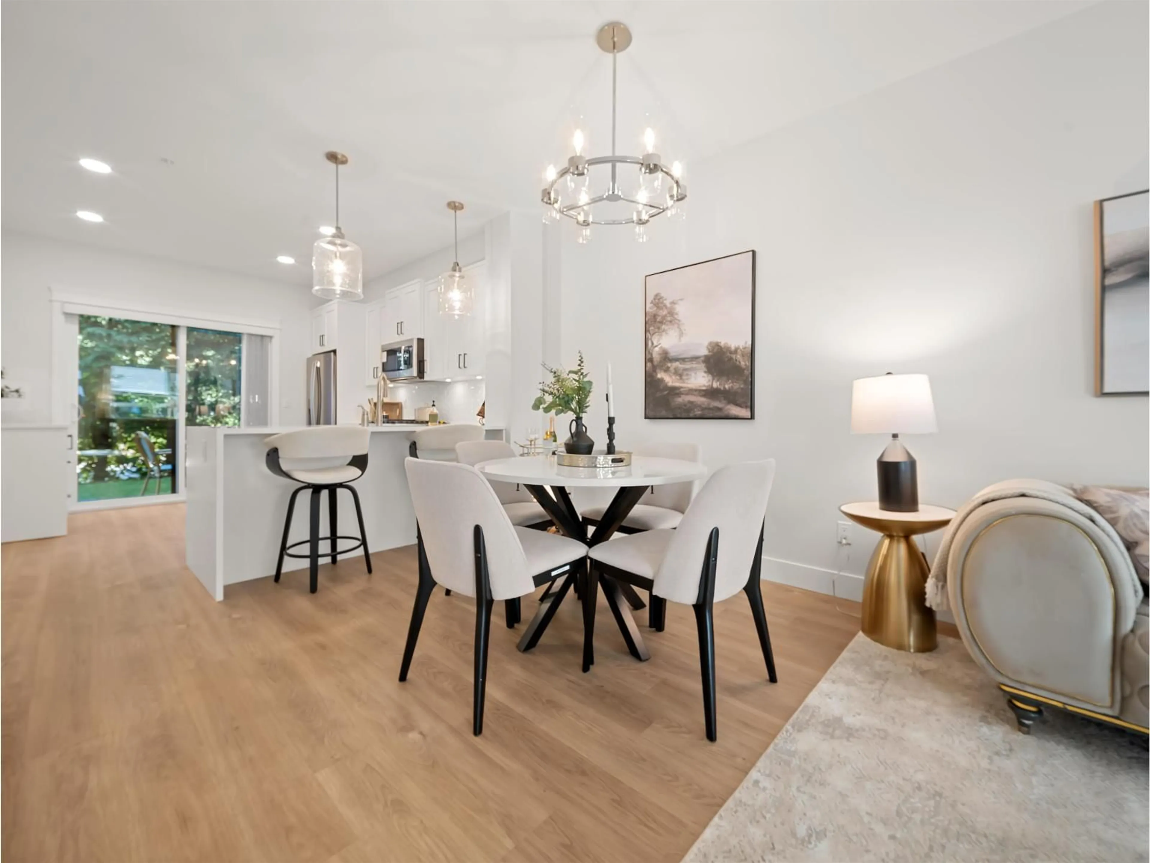 Open concept kitchen, wood/laminate floor for 3 - 20926 83 AVENUE, Langley British Columbia V2Y3Y9
