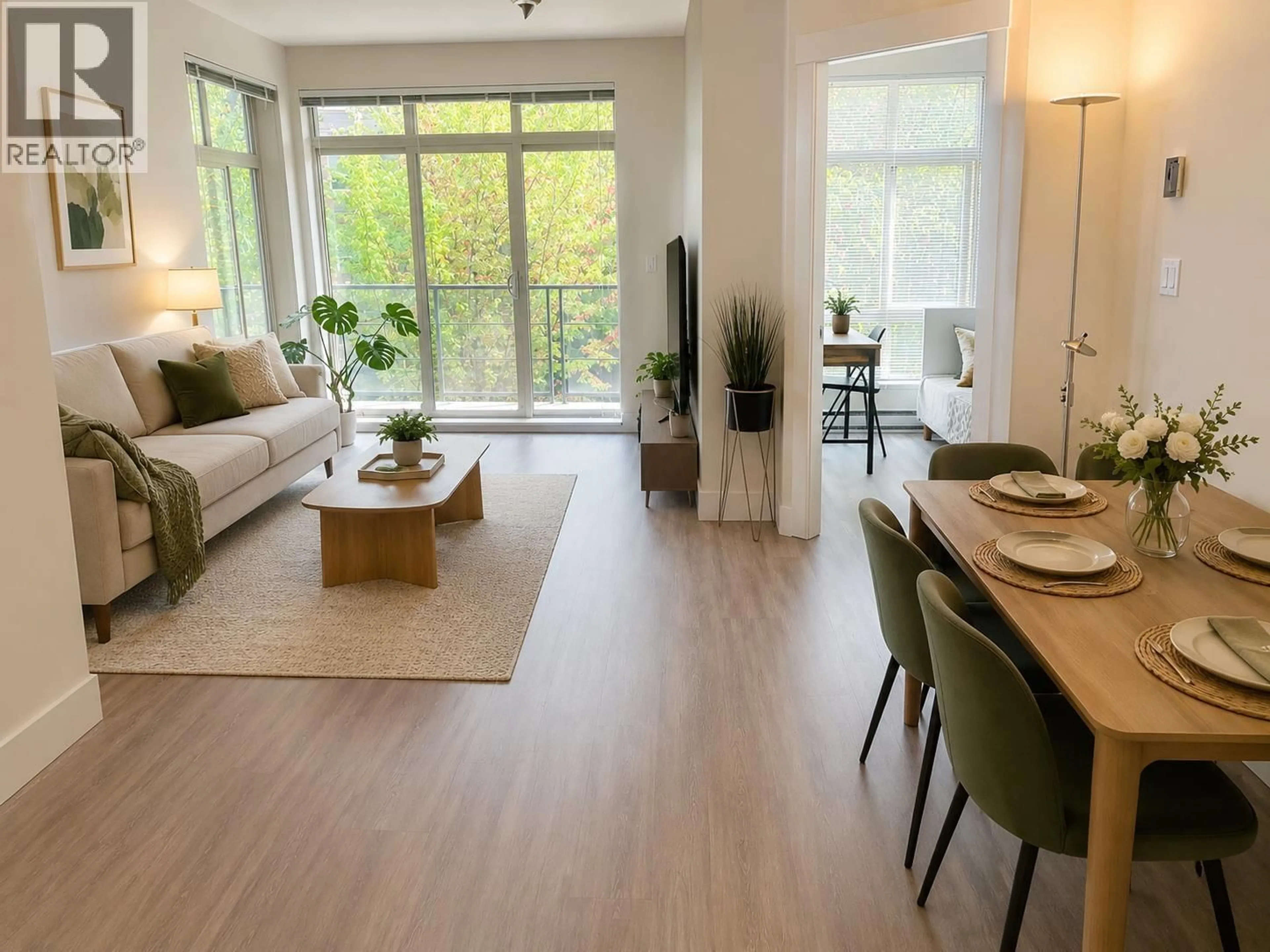 Living room with furniture, wood/laminate floor for 210 - 5779 BIRNEY AVENUE, Vancouver British Columbia V6S0A3