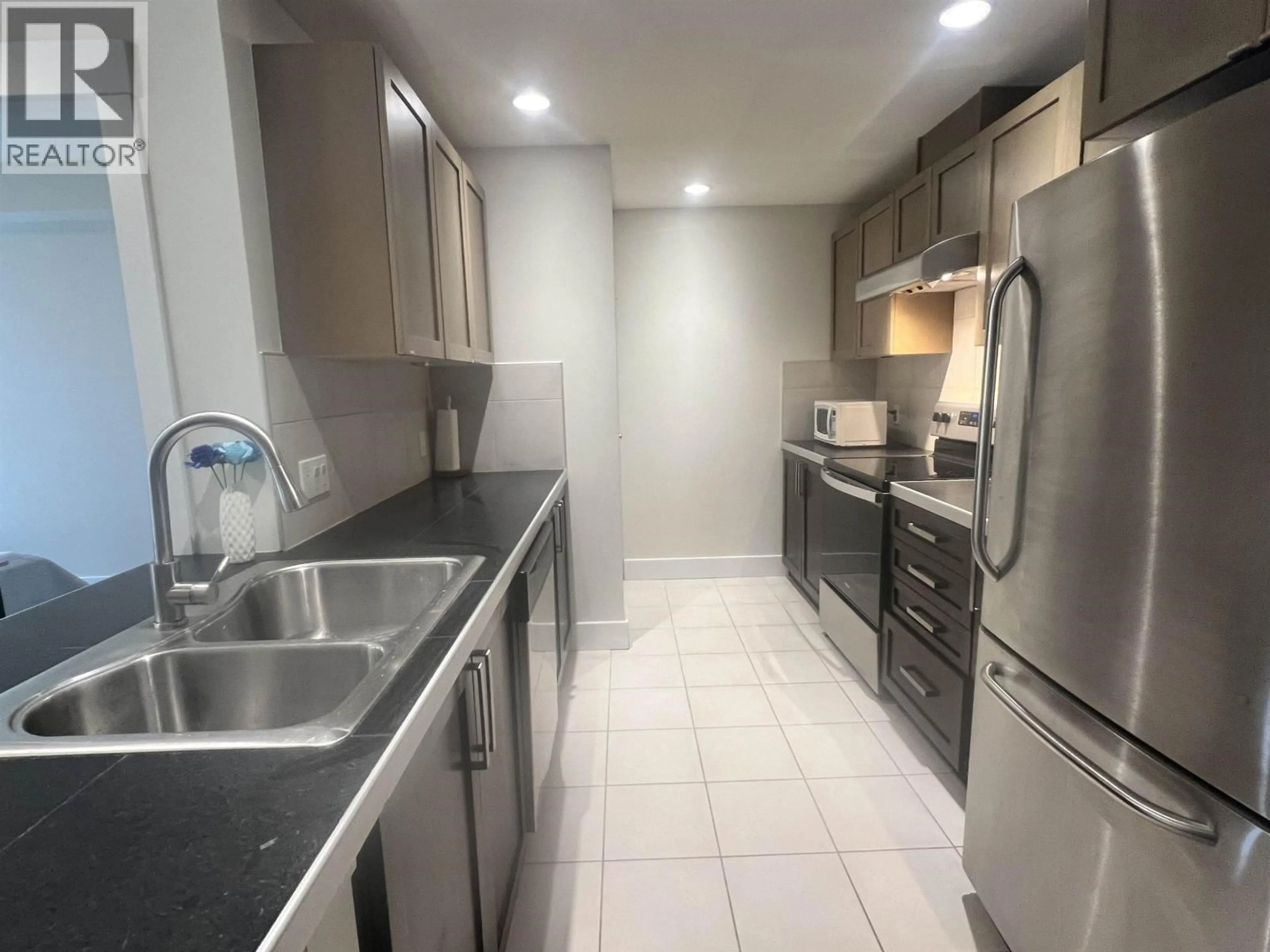 Standard kitchen, ceramic/tile floor for 210 - 5779 BIRNEY AVENUE, Vancouver British Columbia V6S0A3