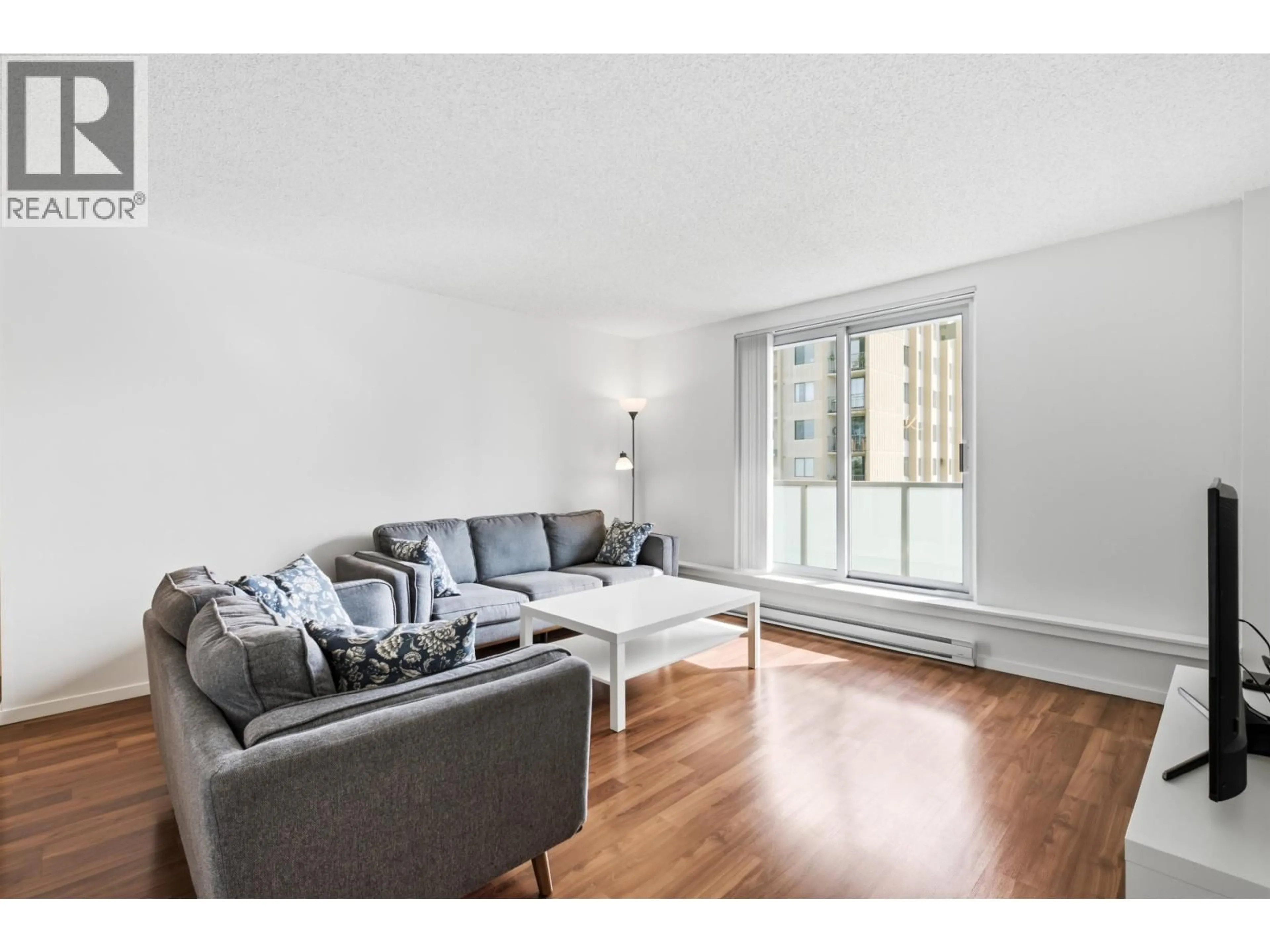 Living room with furniture, wood/laminate floor for 1602 - 9541 ERICKSON DRIVE, Burnaby British Columbia V3J7N8