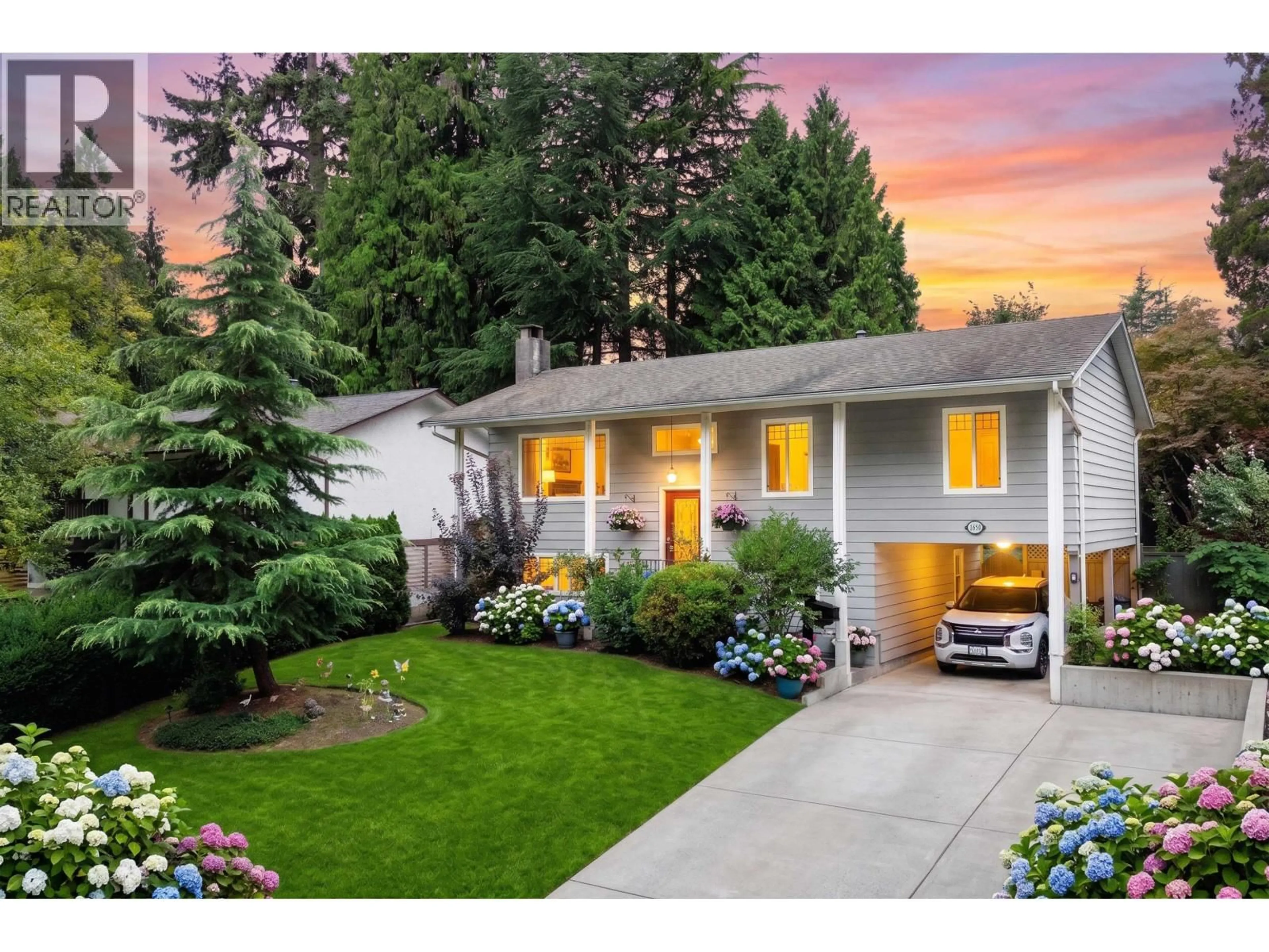 Home with vinyl exterior material, street for 1650 CONNAUGHT DRIVE, Port Coquitlam British Columbia V3C4G8