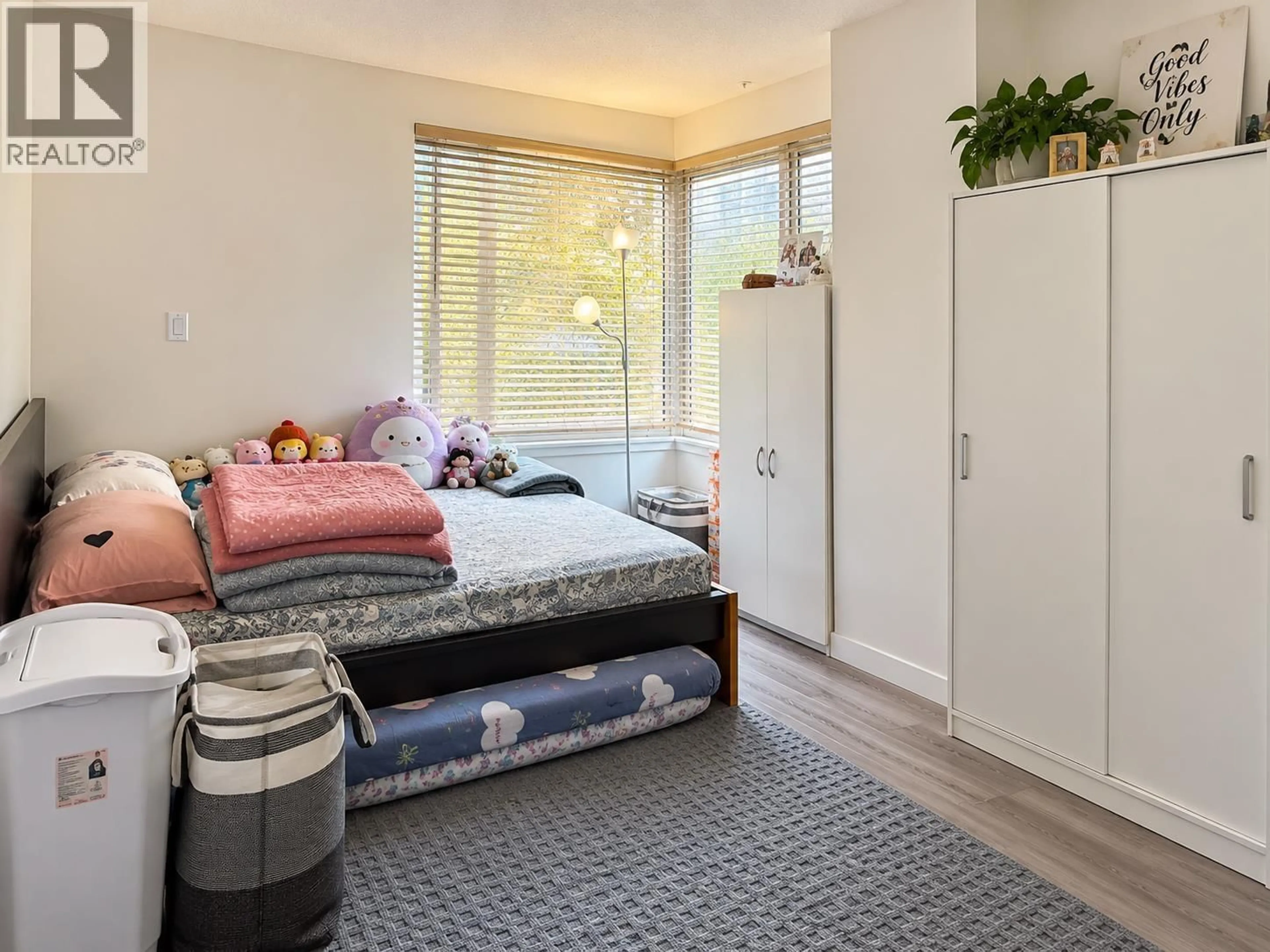 Bedroom with bed, unknown for 205 - 3455 ASCOT PLACE, Vancouver British Columbia V5R6B7