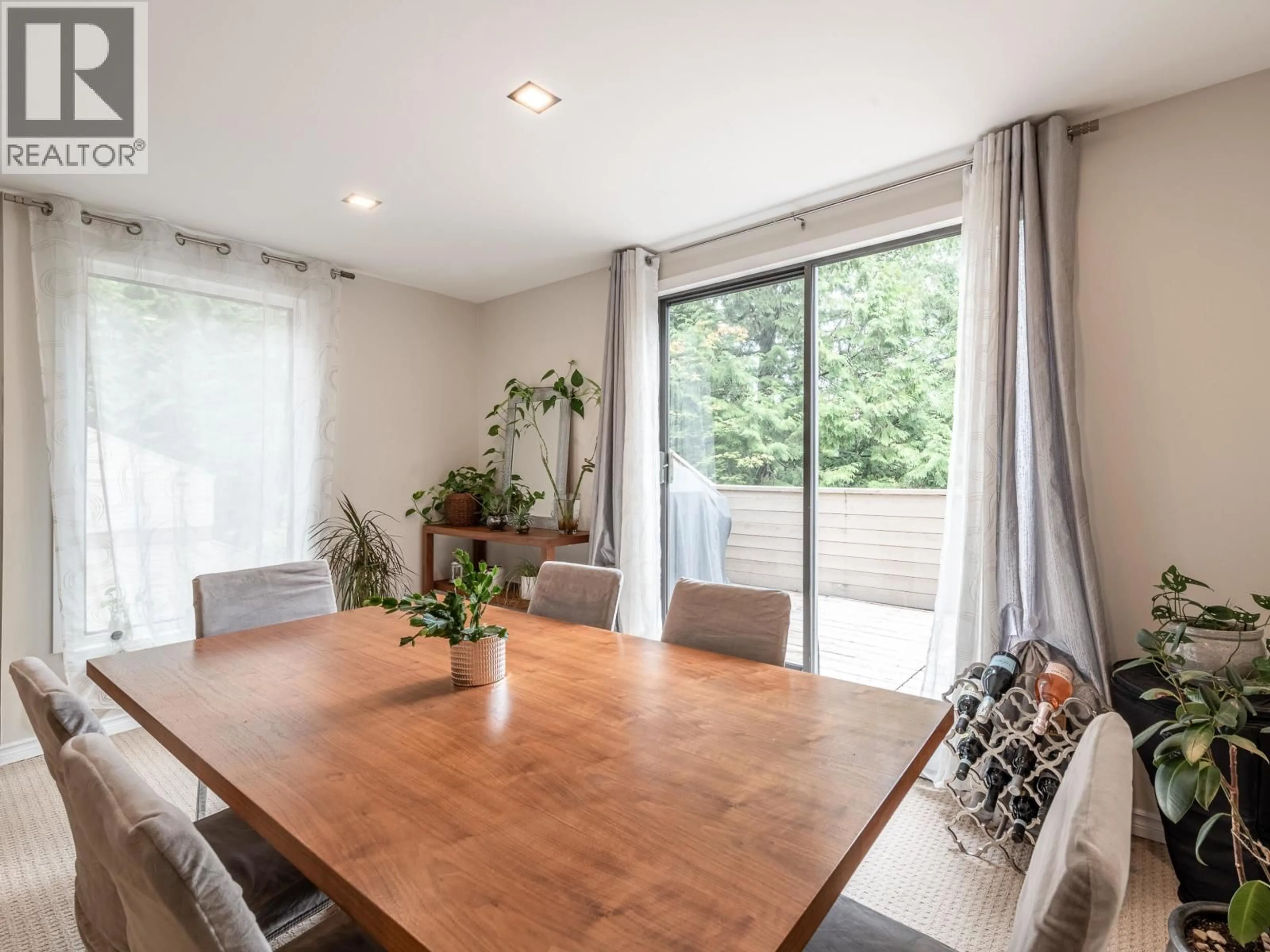 Dining room, wood/laminate floor for 201 - 9152 SATURNA DRIVE, Burnaby British Columbia V3J7K2