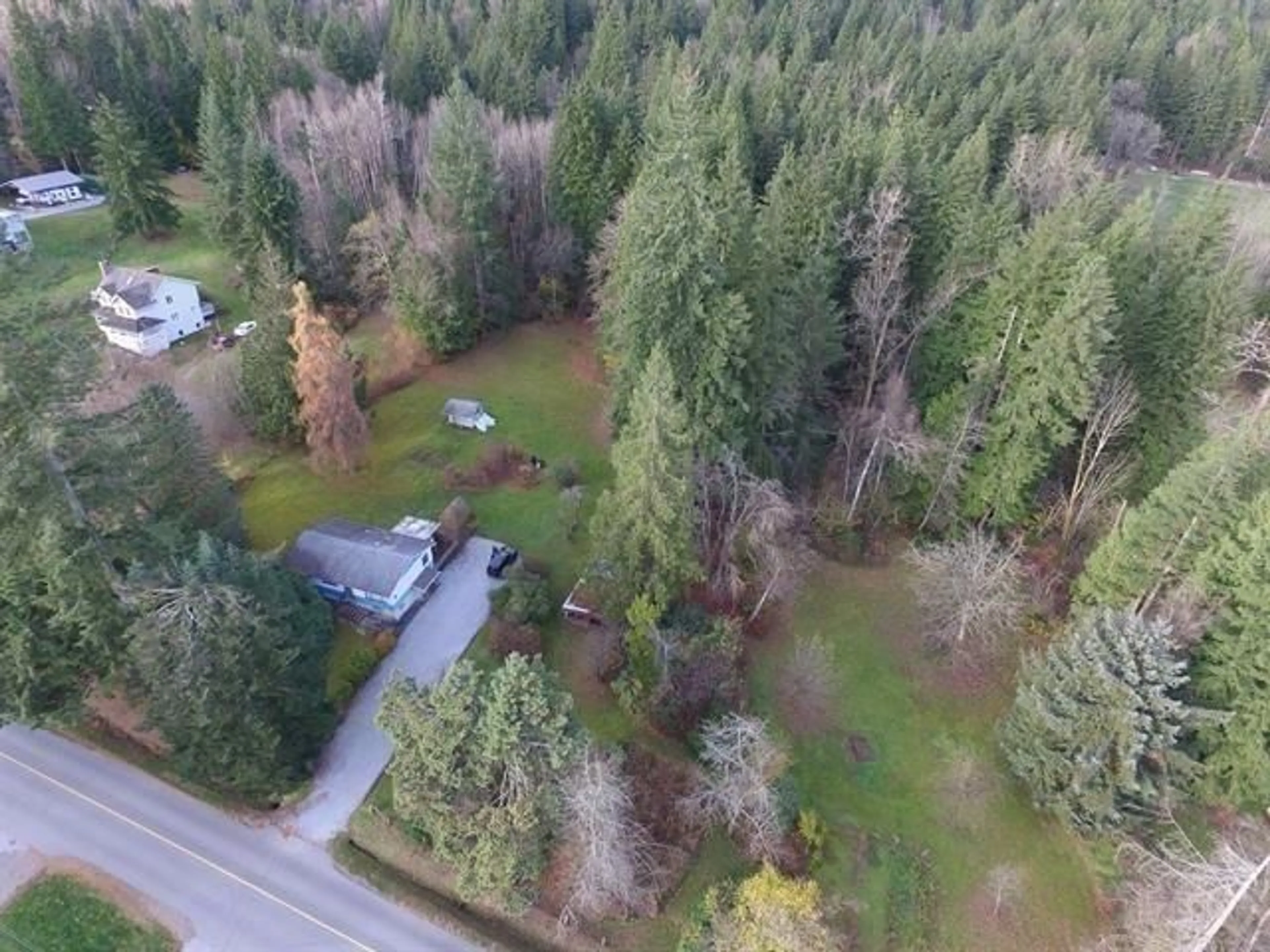 A pic from outside/outdoor area/front of a property/back of a property/a pic from drone, forest/trees view for 33875 RICHARDS AVENUE, Mission British Columbia V2V7E3