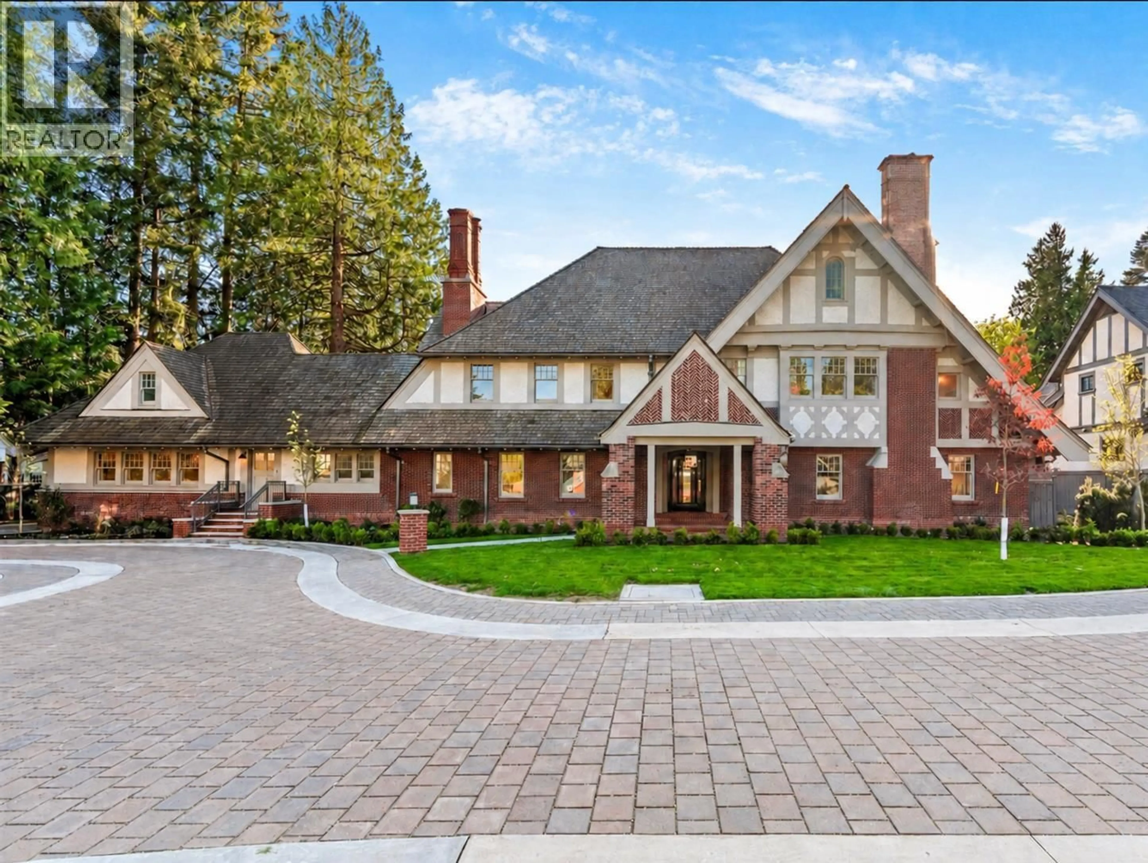 Home with brick exterior material, mountain view for 2050 MARINE DRIVE, Vancouver British Columbia V6P6B5
