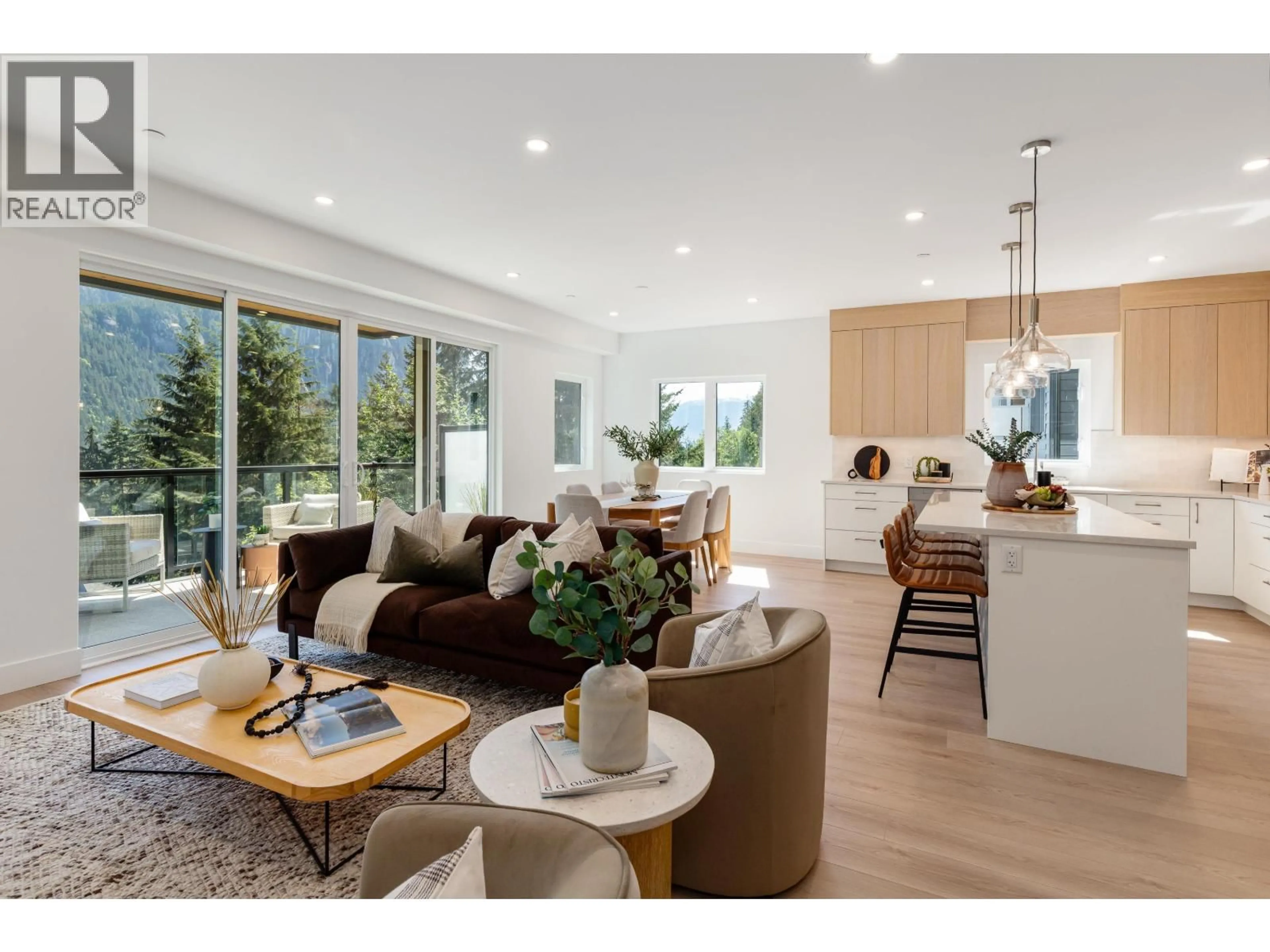 Open concept kitchen, wood/laminate floor for 1 - 2098 CRUMPIT WOODS DRIVE, Squamish British Columbia V8B0T6