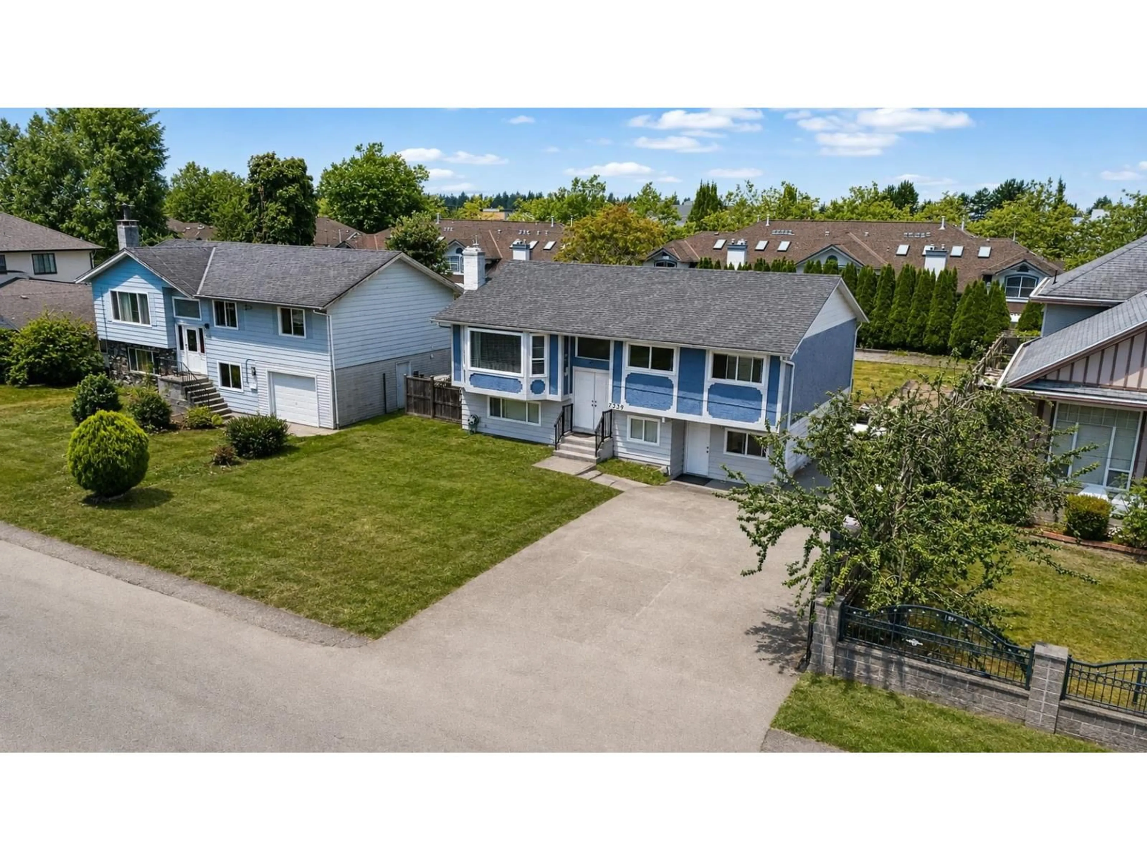 A pic from outside/outdoor area/front of a property/back of a property/a pic from drone, street for 7339 122A STREET, Surrey British Columbia V3W3T2