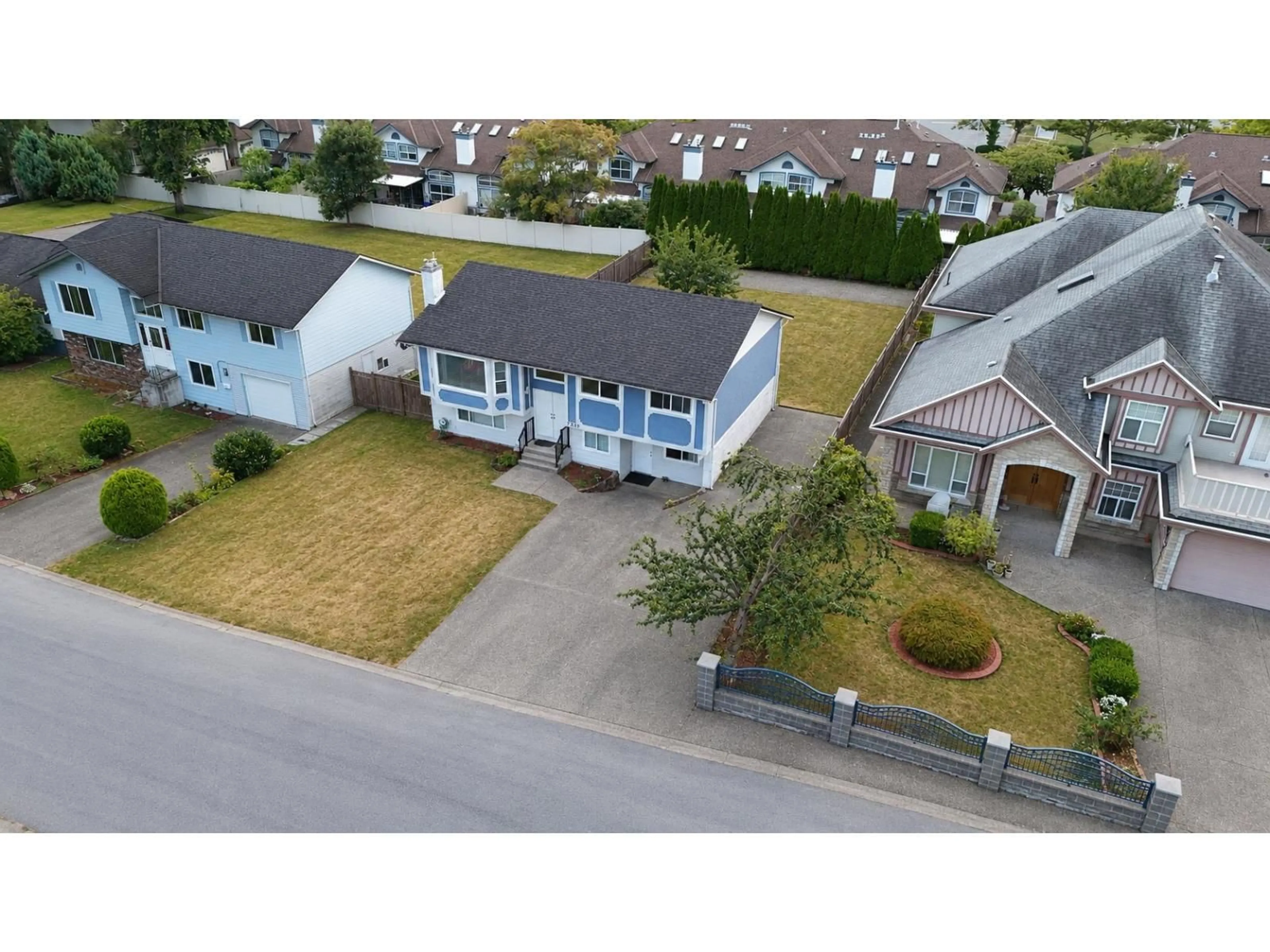 A pic from outside/outdoor area/front of a property/back of a property/a pic from drone, street for 7339 122A STREET, Surrey British Columbia V3W3T2