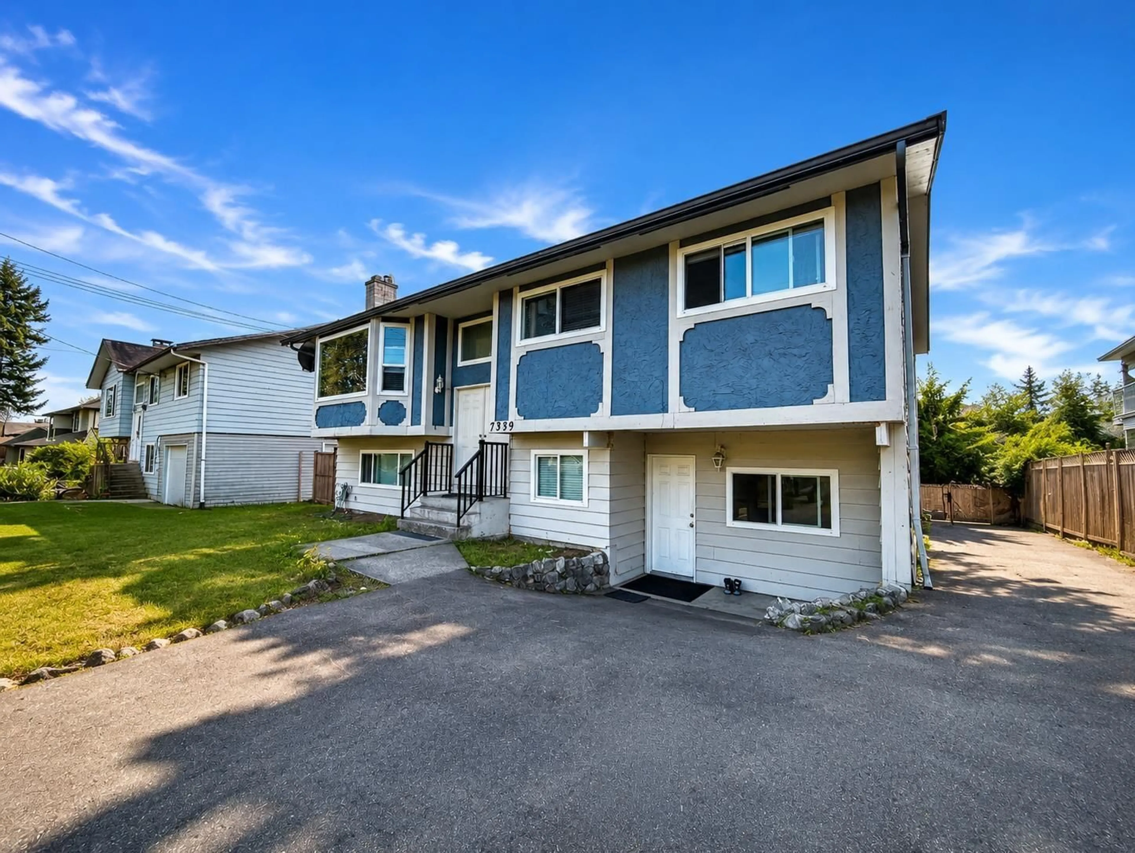 Home with vinyl exterior material, street for 7339 122A STREET, Surrey British Columbia V3W3T2