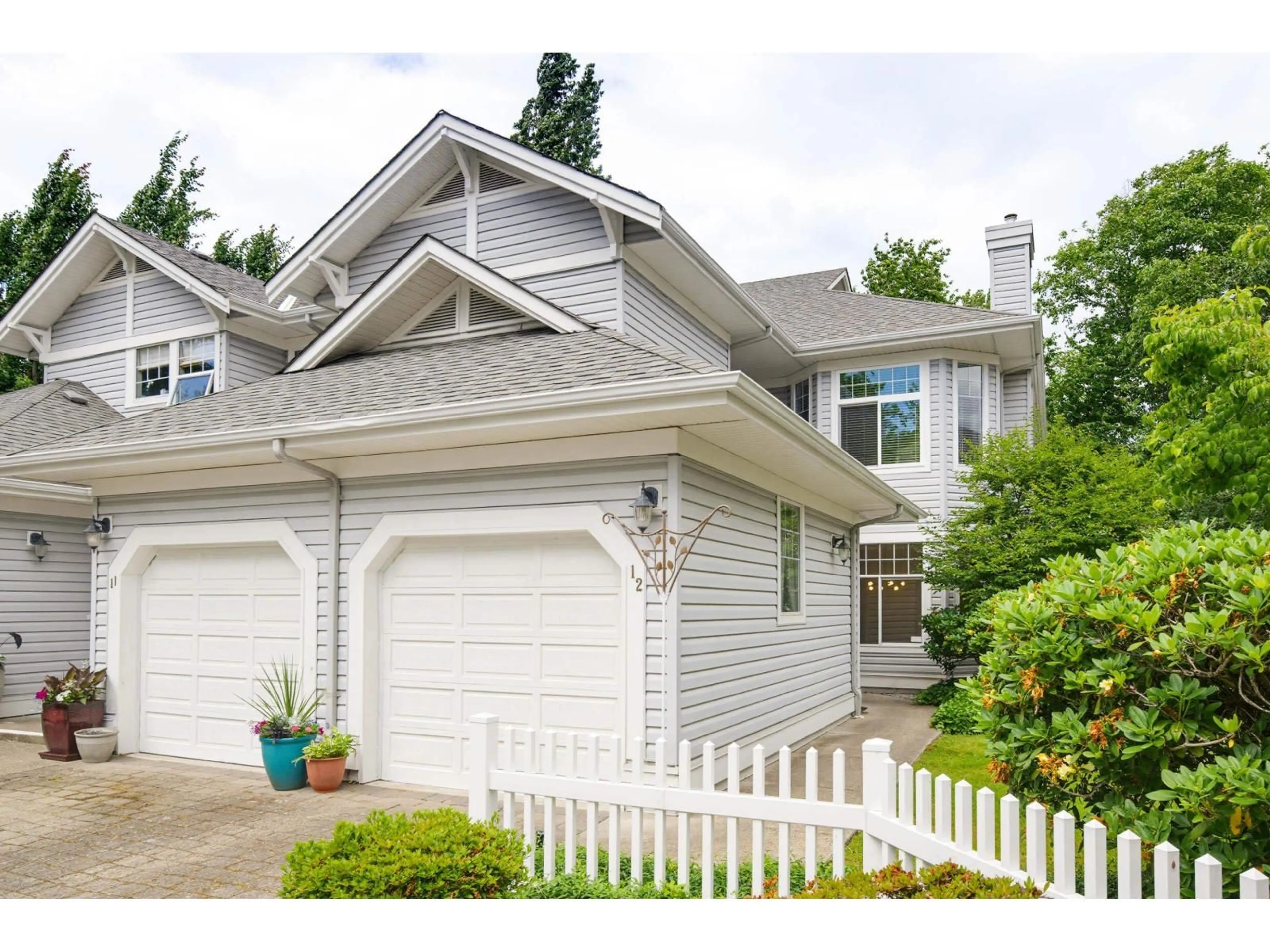 Home with vinyl exterior material, street for 12 - 5708 208 STREET, Langley British Columbia V3A8L4